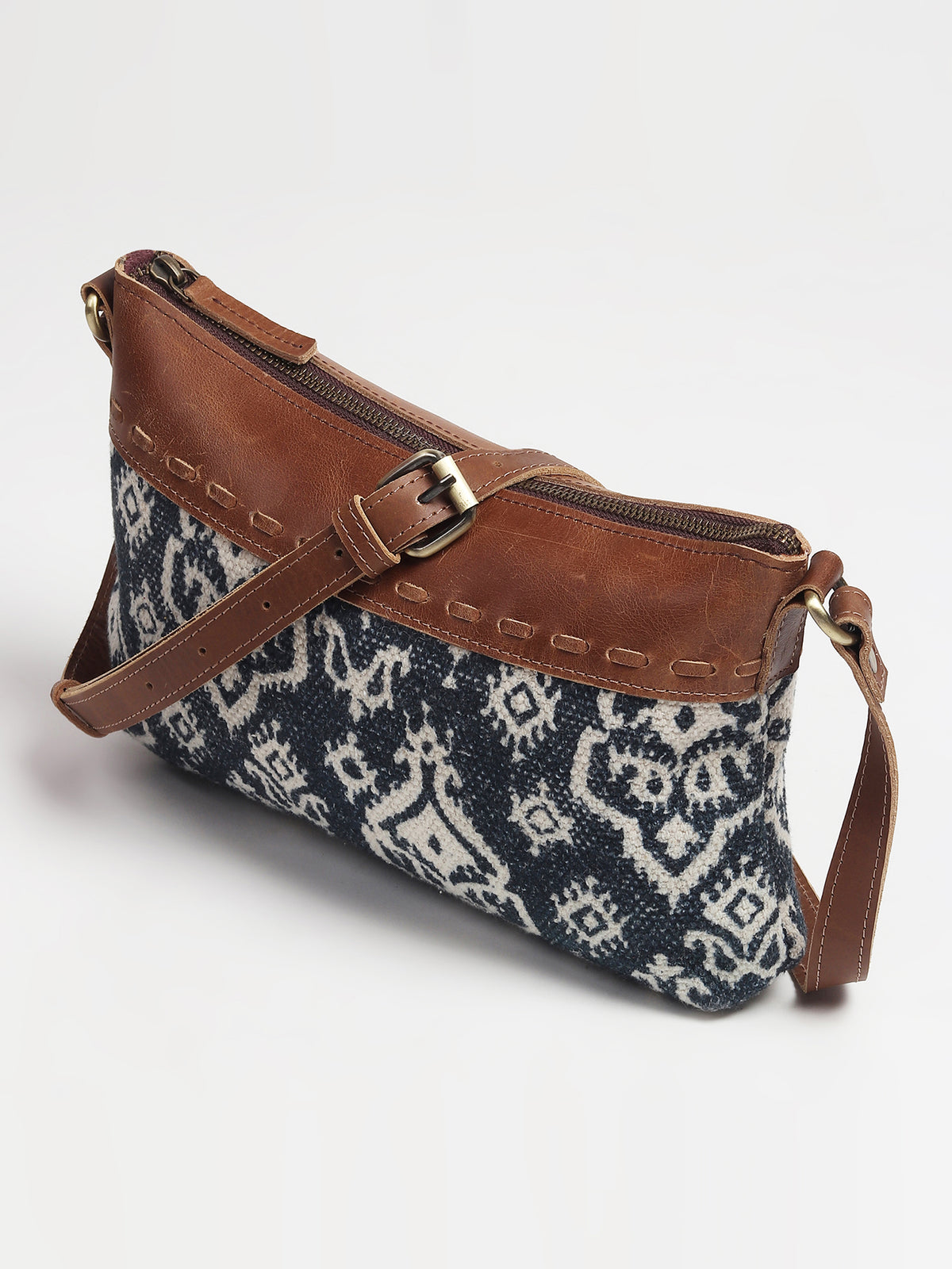 Ava leather sling bag, side view — Art Avenue