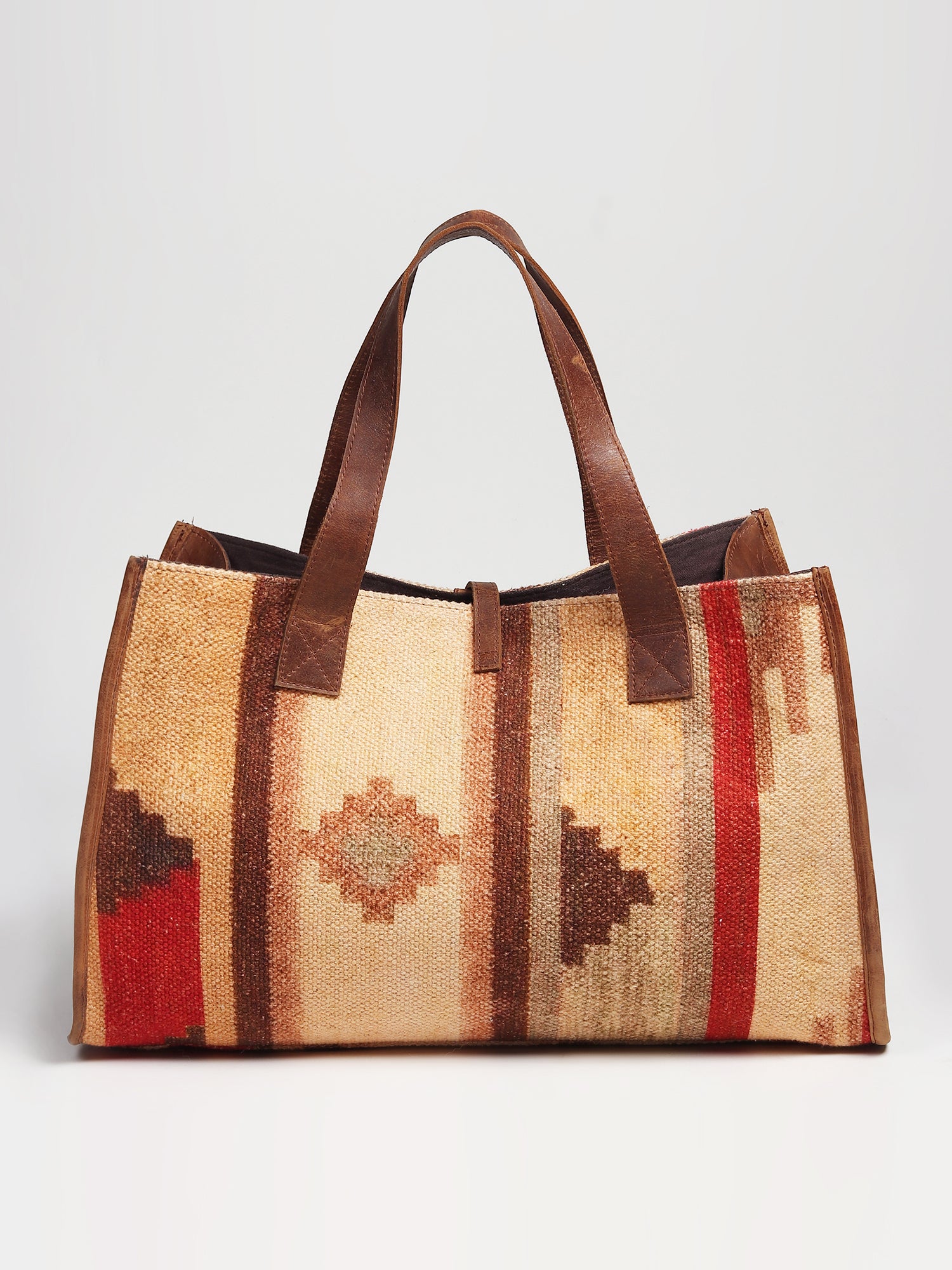 Natalie printed kilim and leather handbag lifestyle — Art Avenue