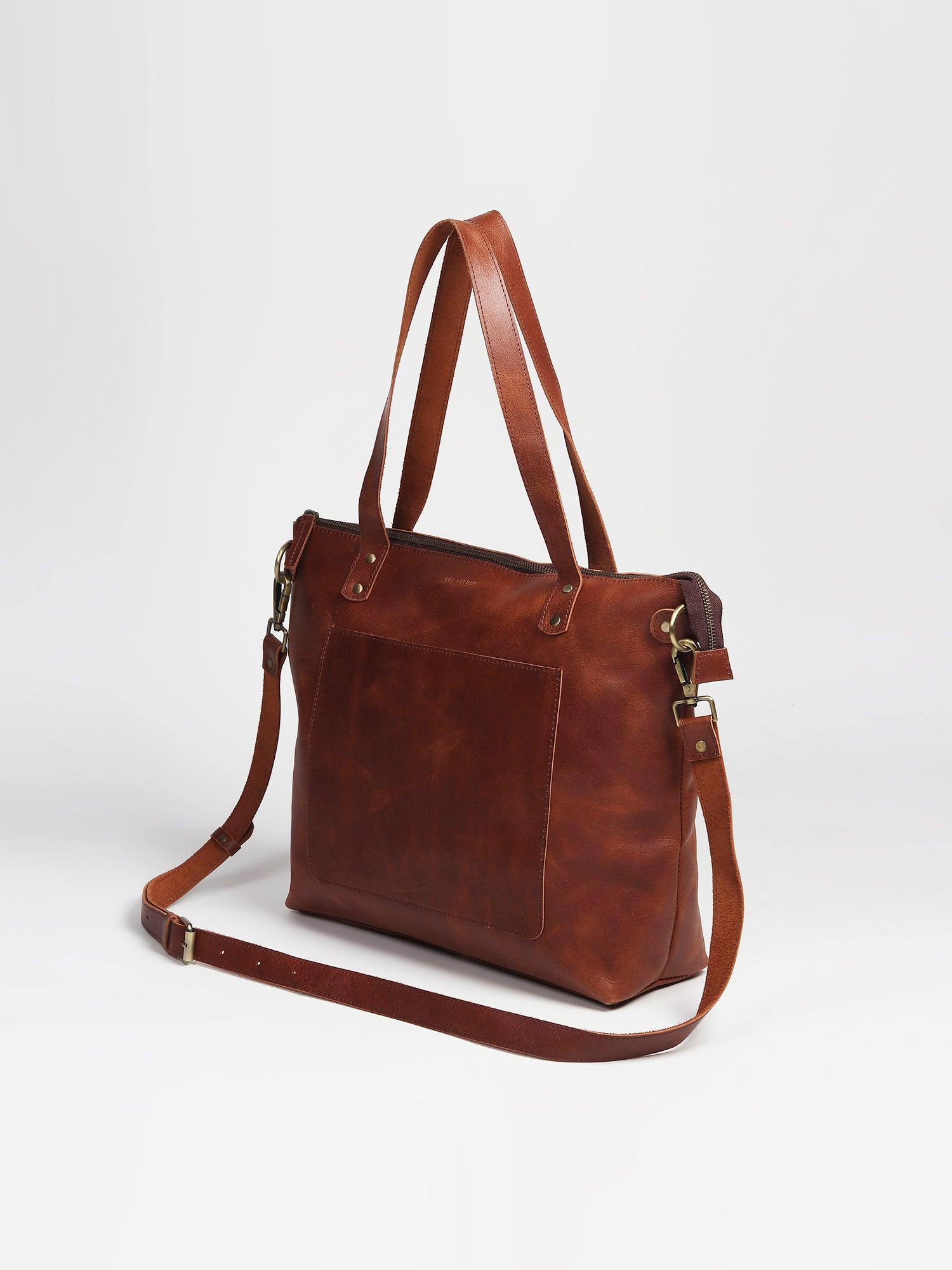 Ergot leather bag strap and closure detail — Art Avenue
