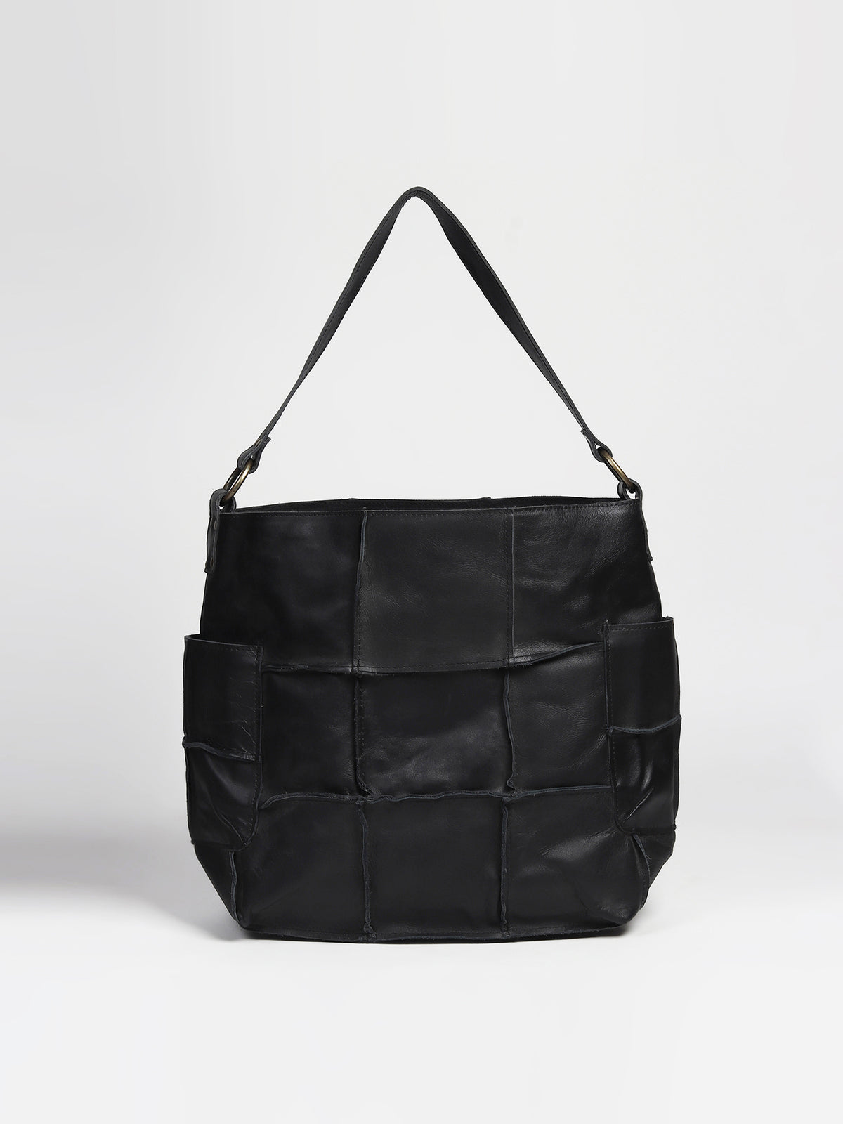 Blazon leather patchwork handbag on model — Art Avenue