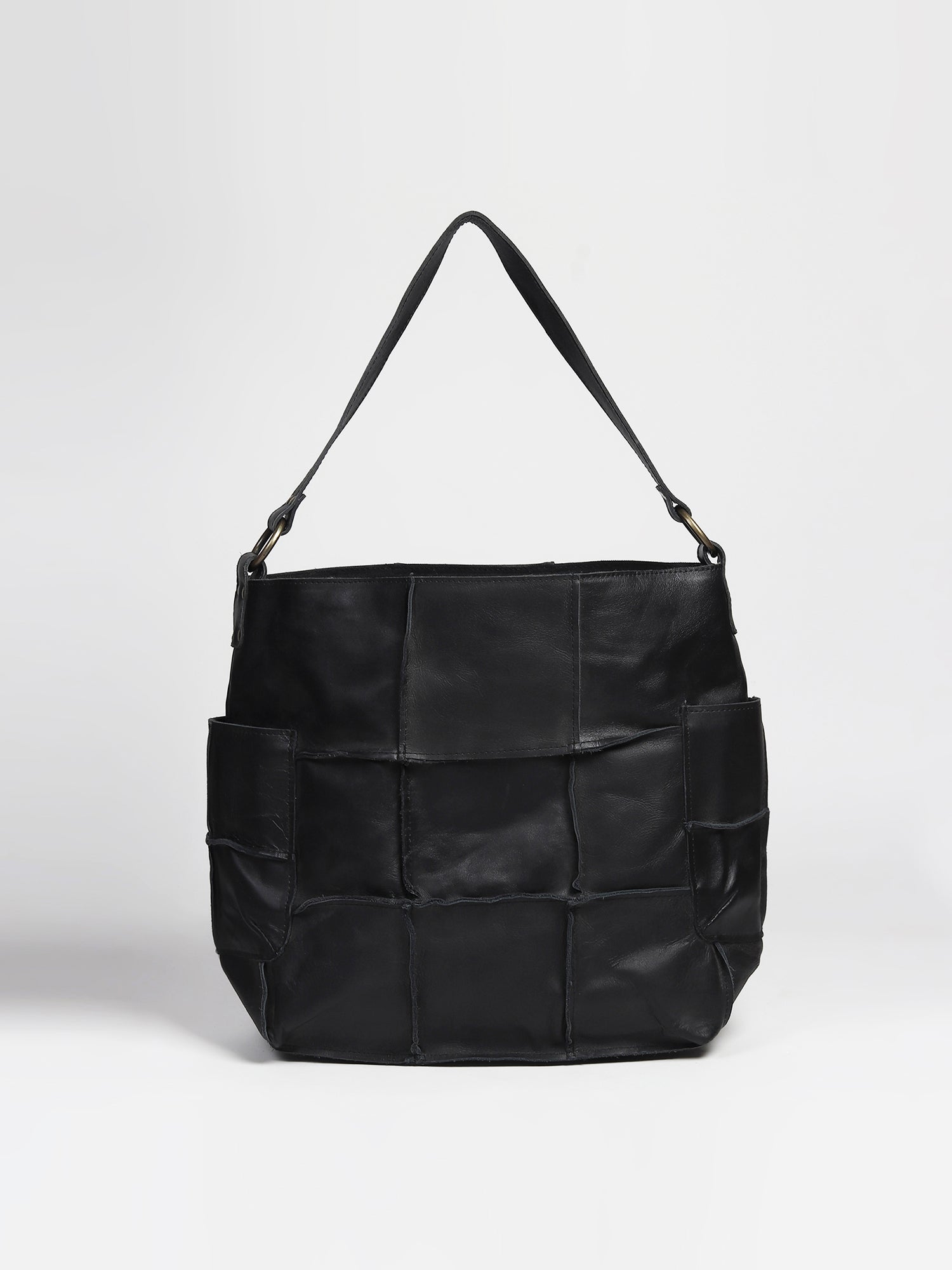 Blazon leather patchwork handbag on model — Art Avenue