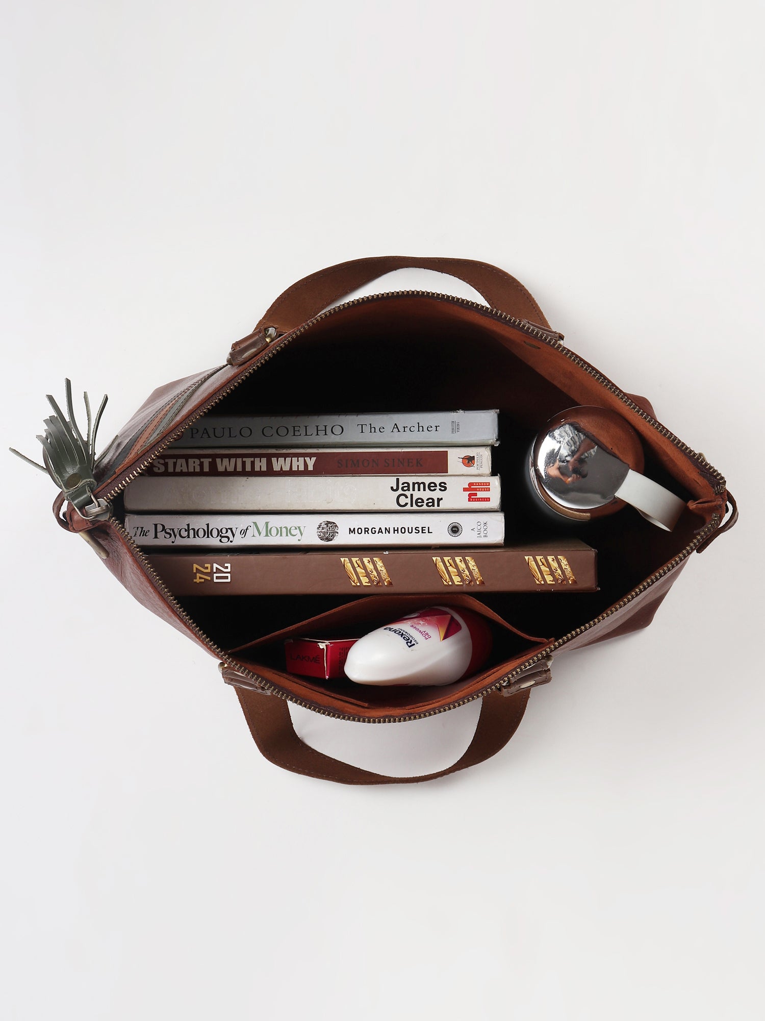 Surrane leather tote bag flat lay — Art Avenue
