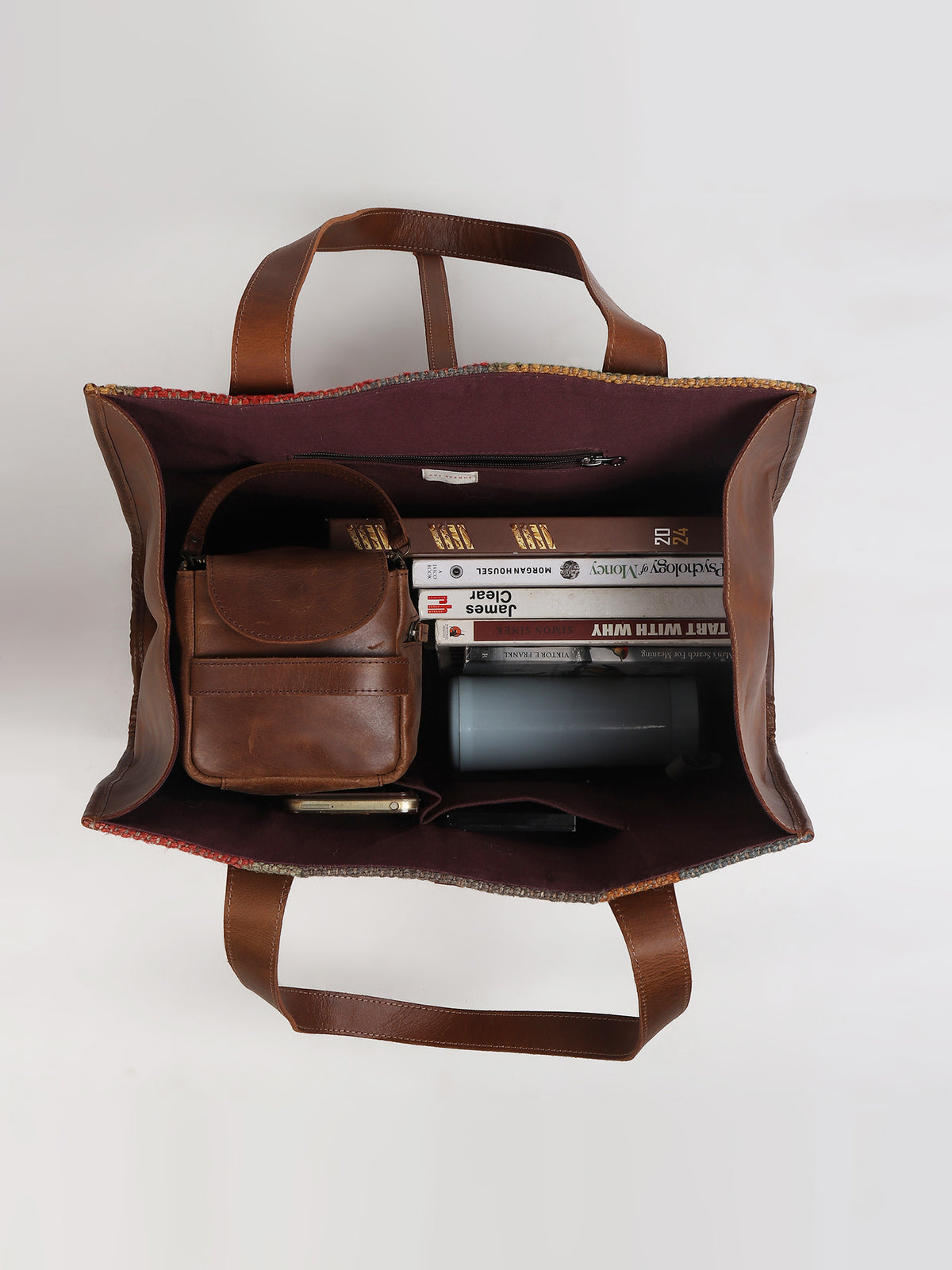 Umbra kilim and leather handbag interior — Art Avenue