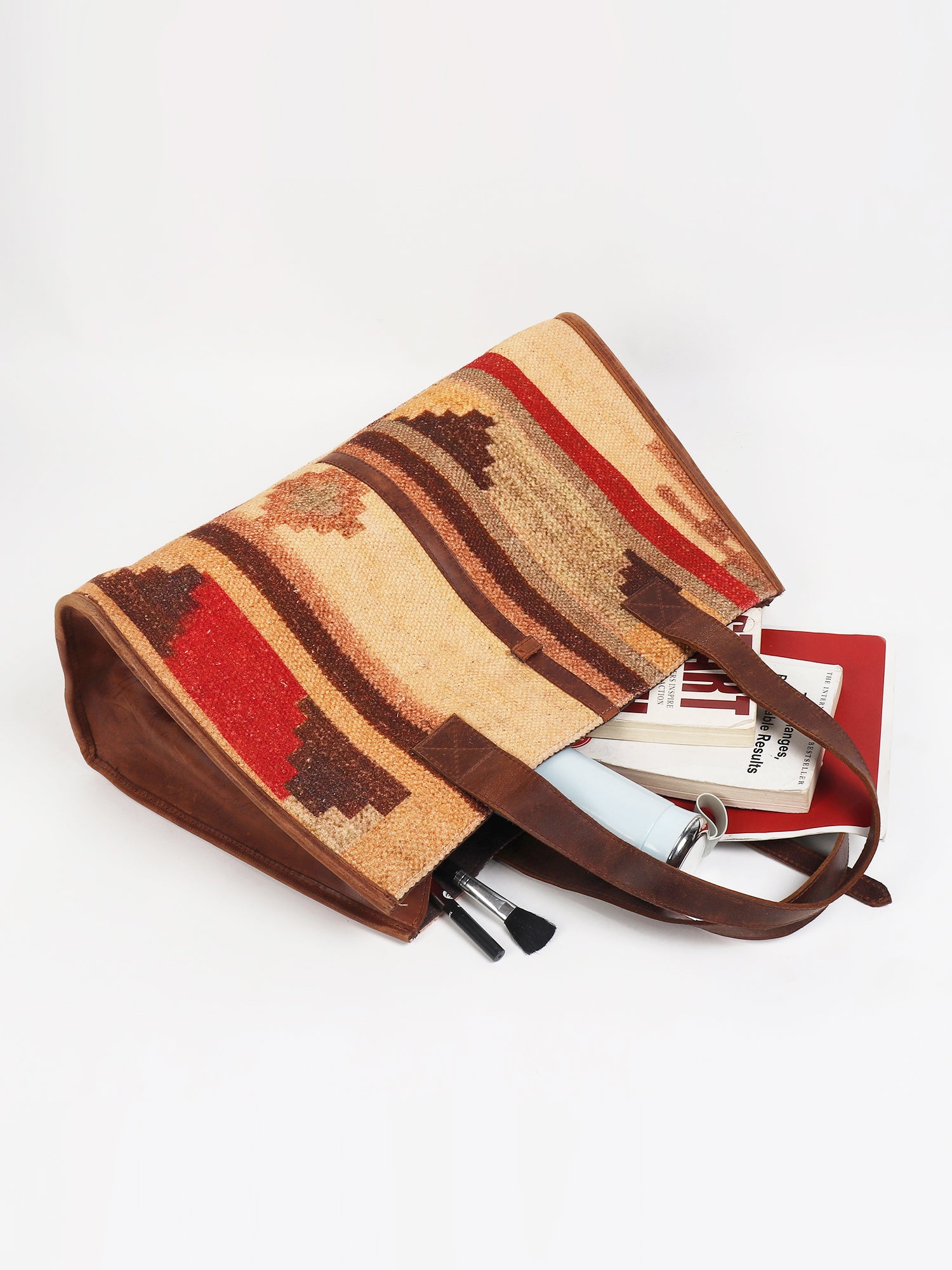 Natalie printed kilim handbag on model — Art Avenue