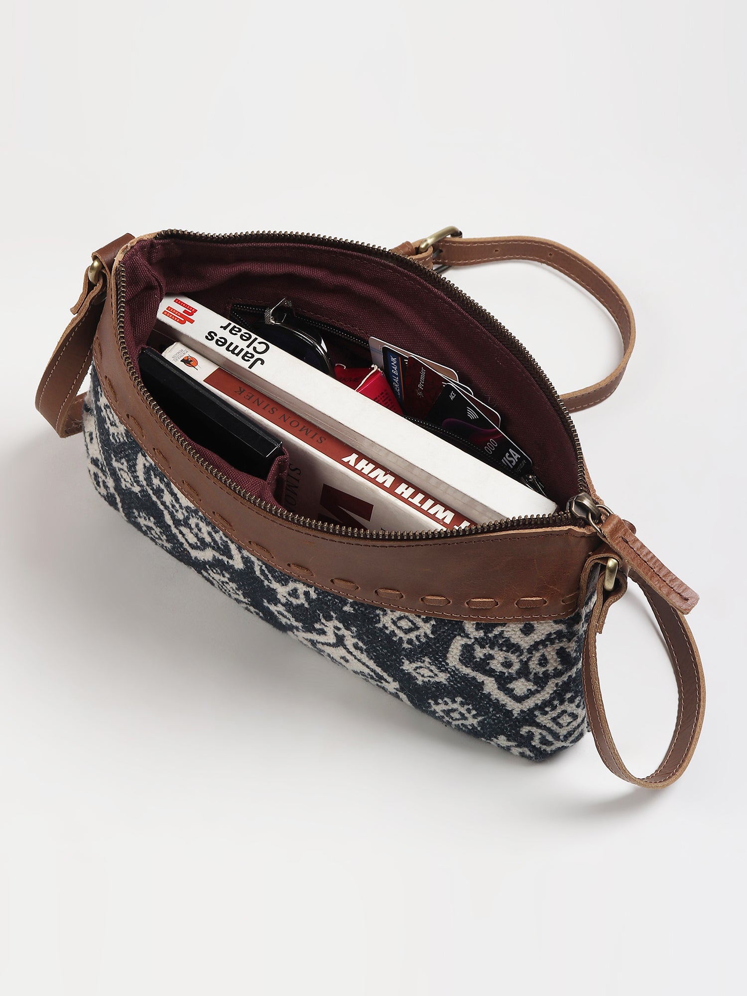Ava leather sling bag on model — Art Avenue