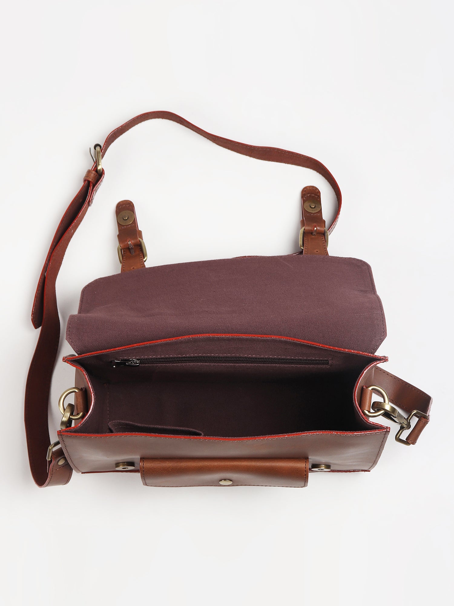 Obsidian leather sling bag hardware detail — Art Avenue