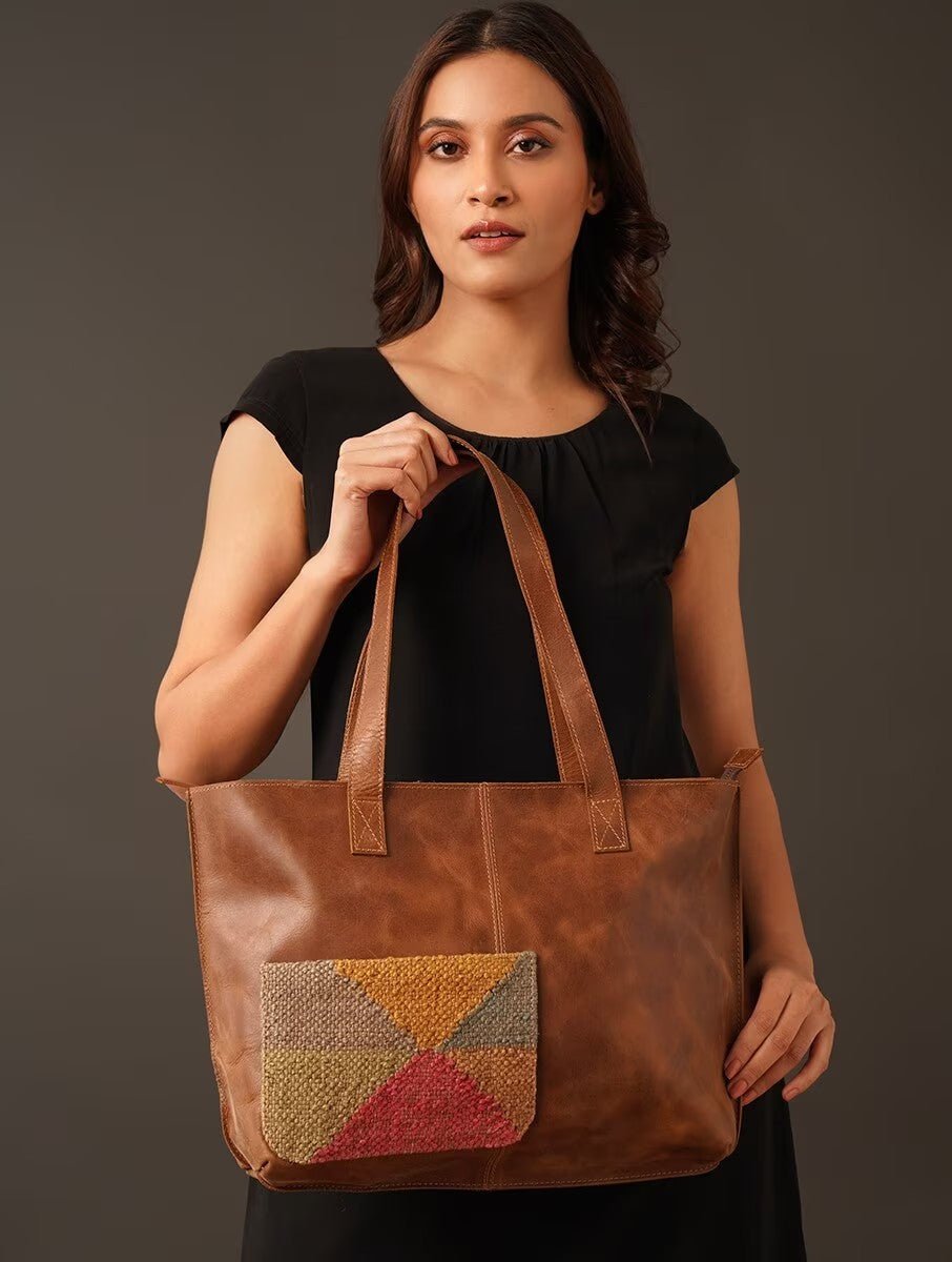 Ezra leather handbag on model — Art Avenue
