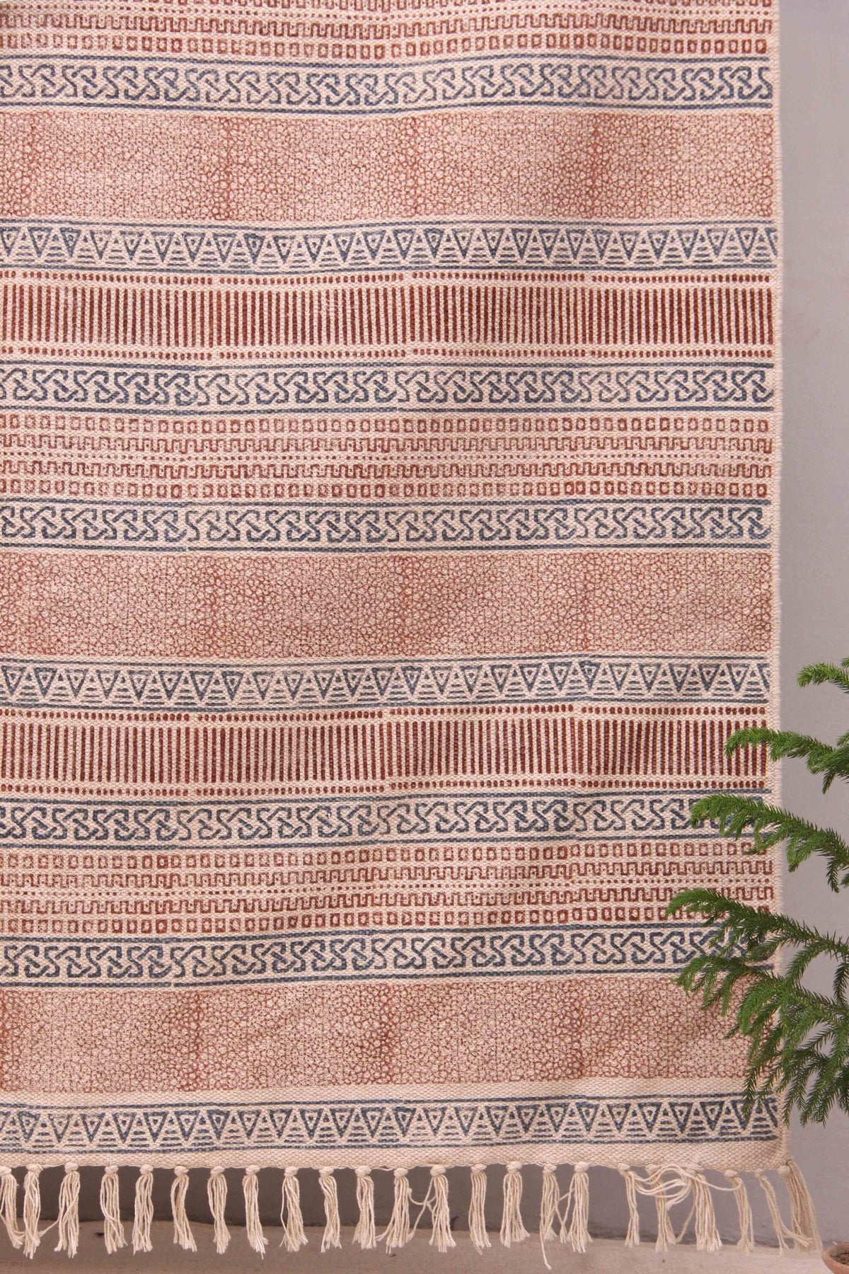 Block-printed cotton dhurrie rug in room setting — Art Avenue