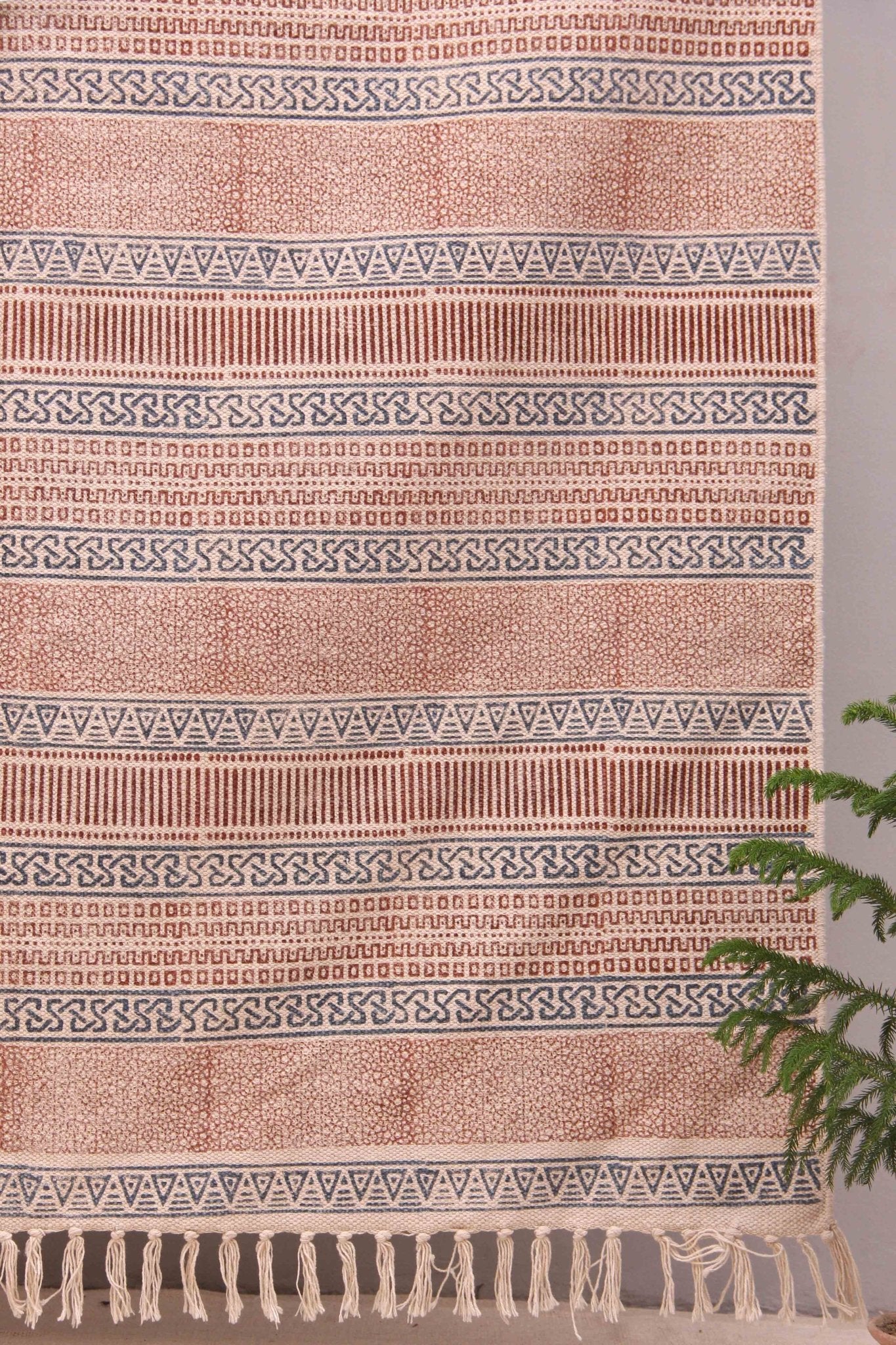 Block-printed cotton dhurrie rug in room setting — Art Avenue