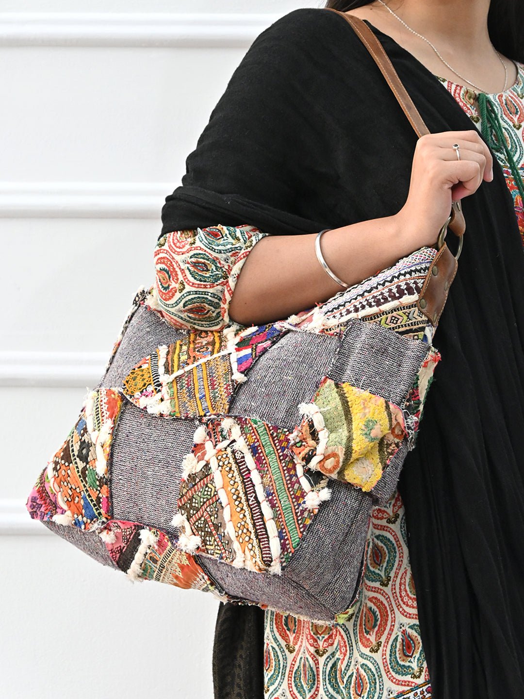 Winked patchwork handbag detail — Art Avenue