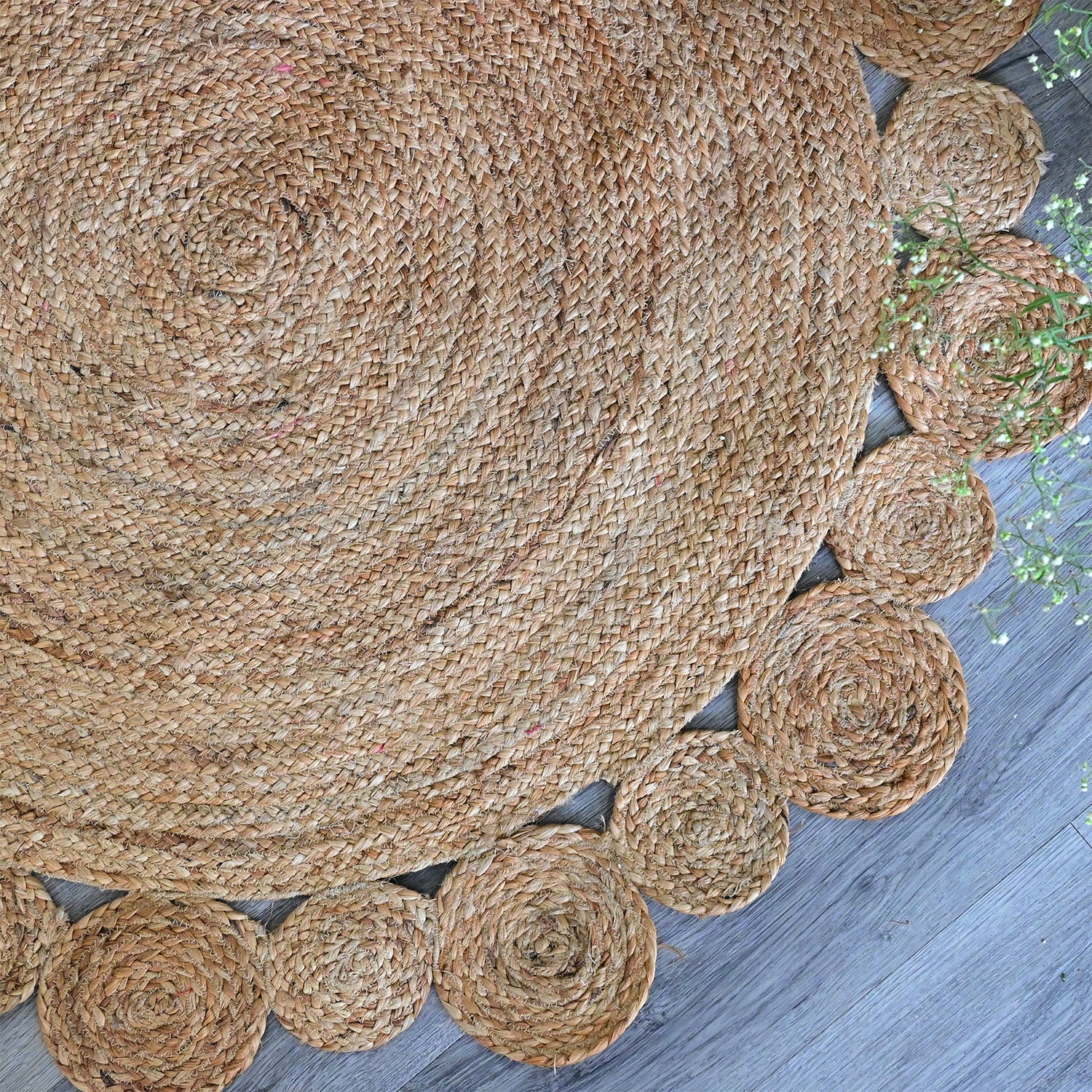 Denver round jute rug room setting — Art Avenue India
