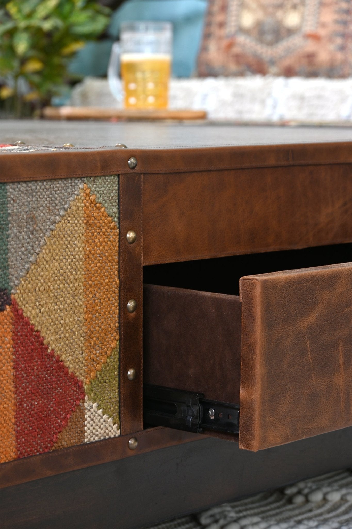 Chandigarh kilim leather coffee table — room setting, Art Avenue