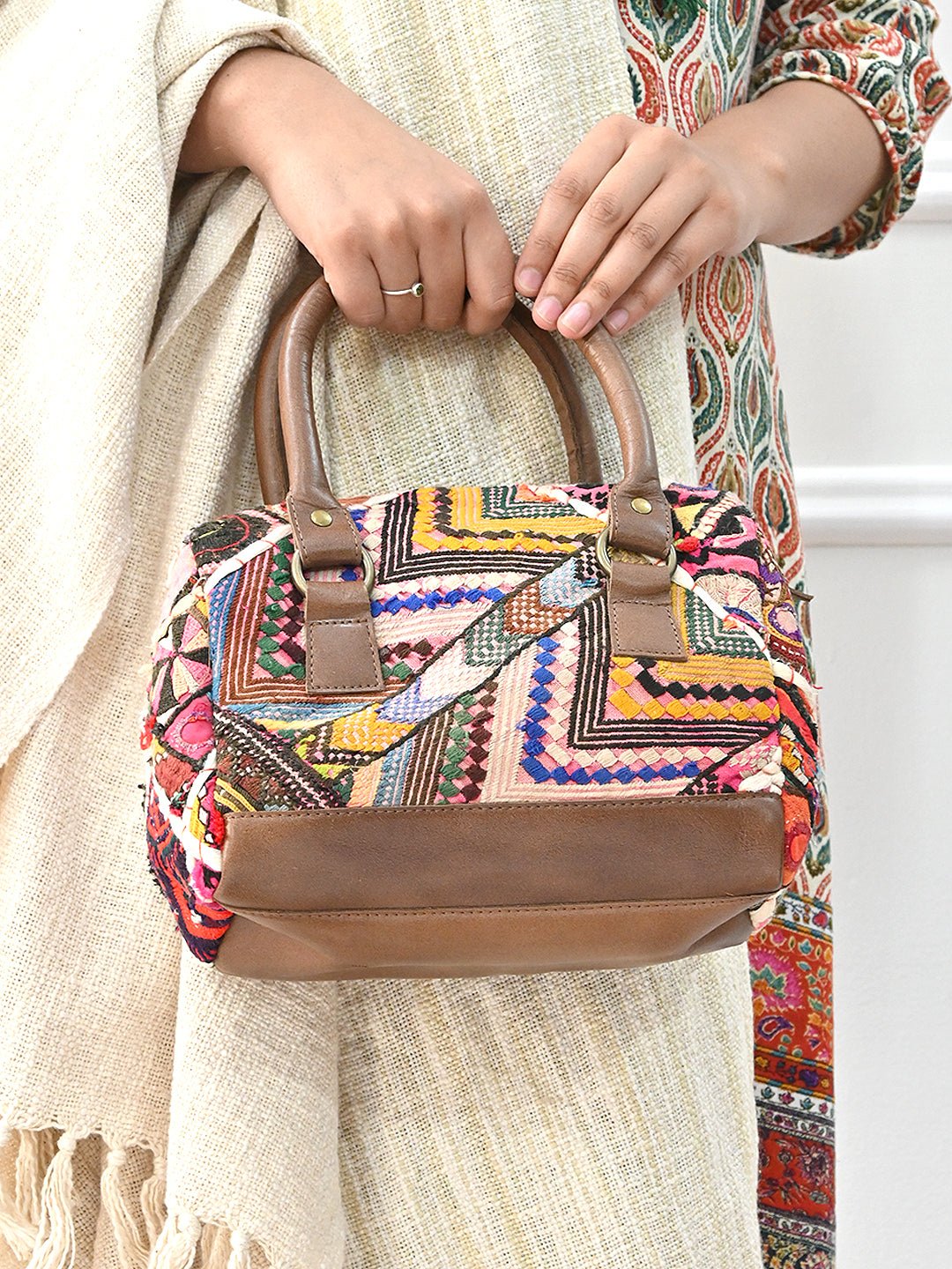 Sparky vintage patchwork duffle bag flat lay — Art Avenue