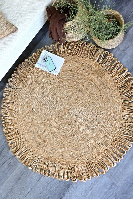 Desire round braided jute rug — handmade in Jaipur