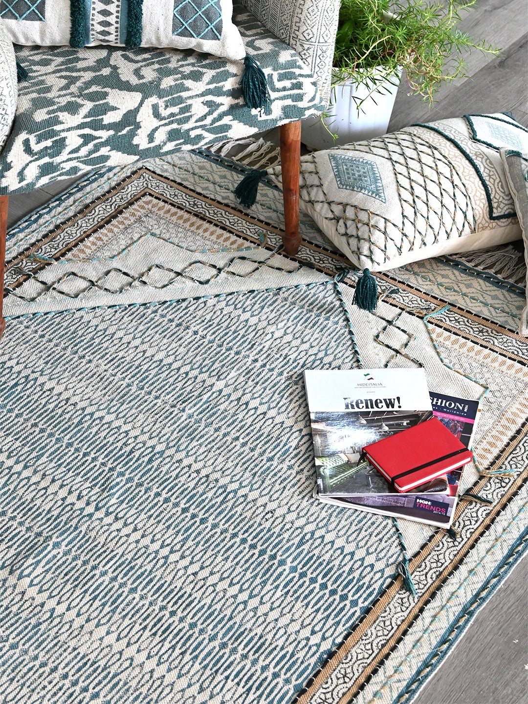 Detail of floral block-print on blue and green dhurrie rug — Art Avenue