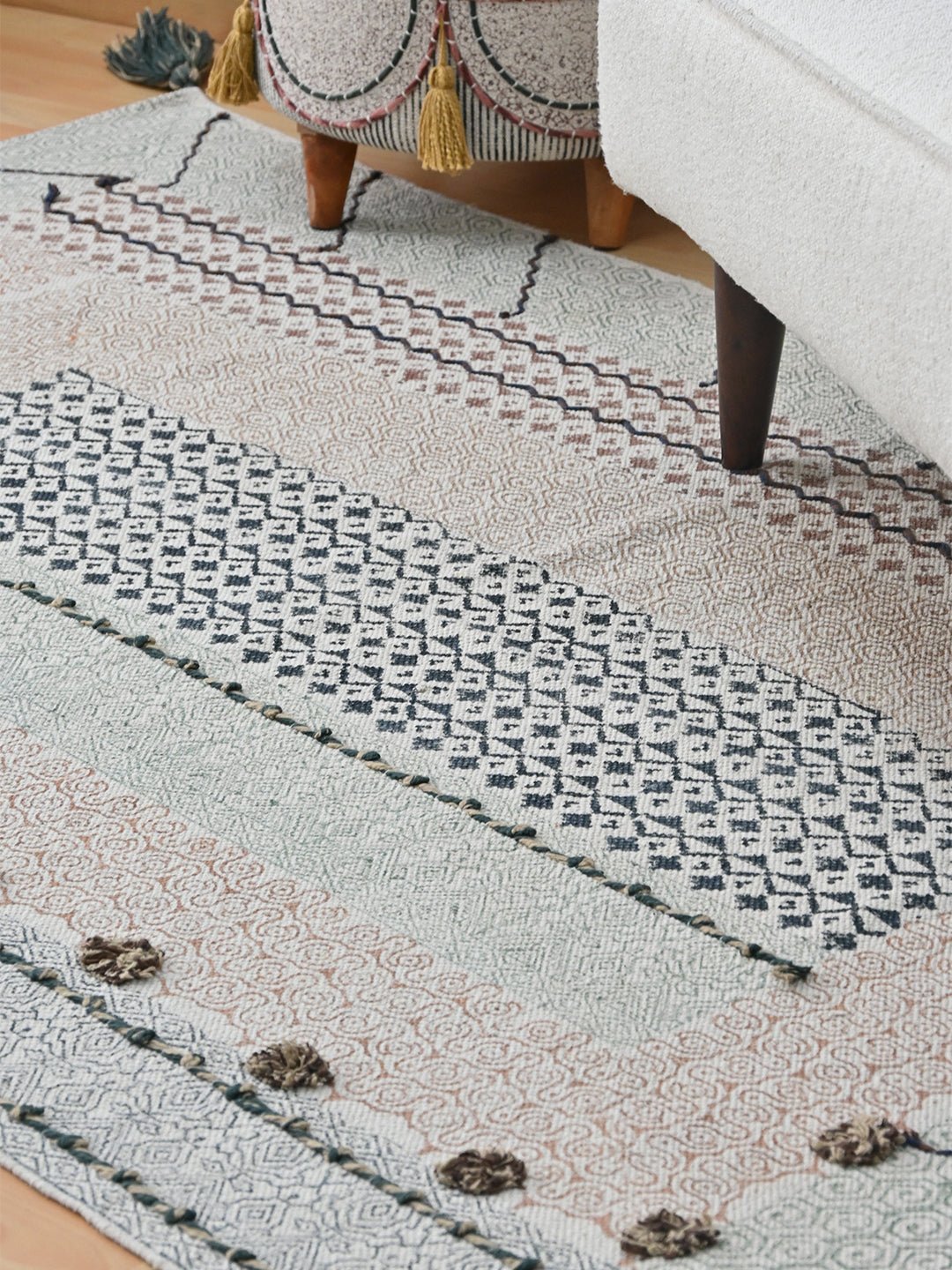 Block-printed cotton dhurrie rug in room setting — Art Avenue