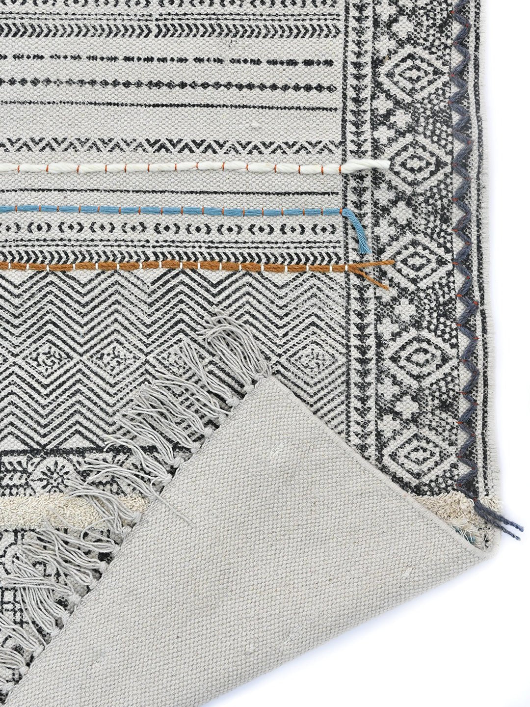 Detail of floral block-print on cotton dhurrie rug — Art Avenue