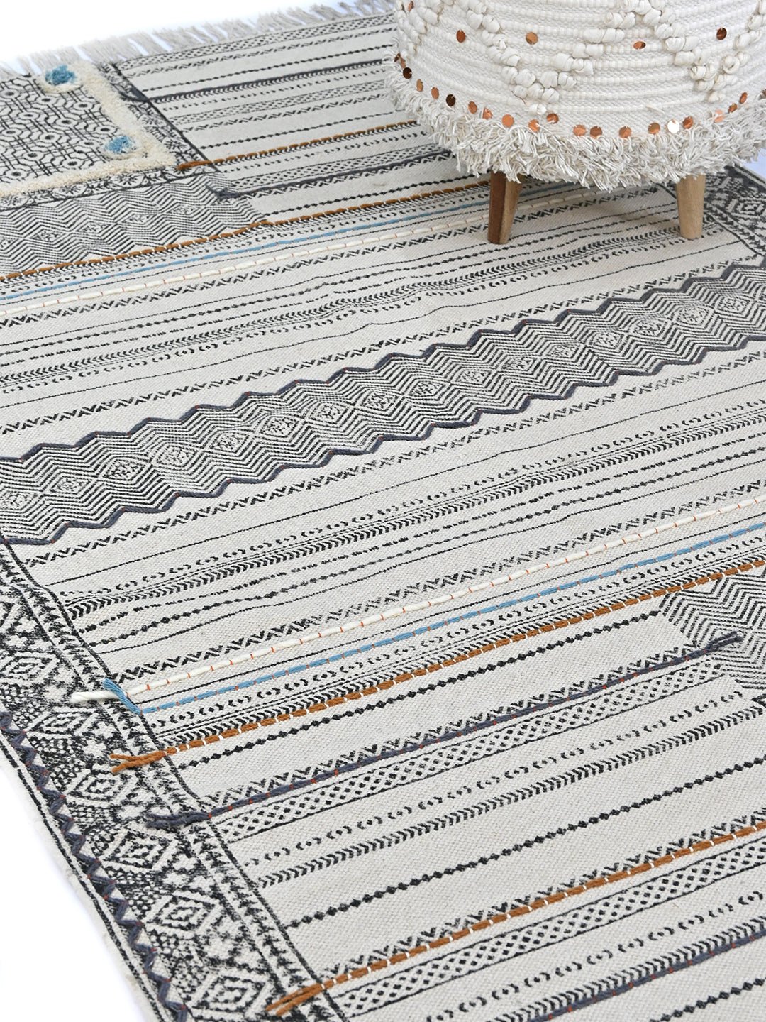 Block-printed cotton dhurrie rug in room setting — Art Avenue