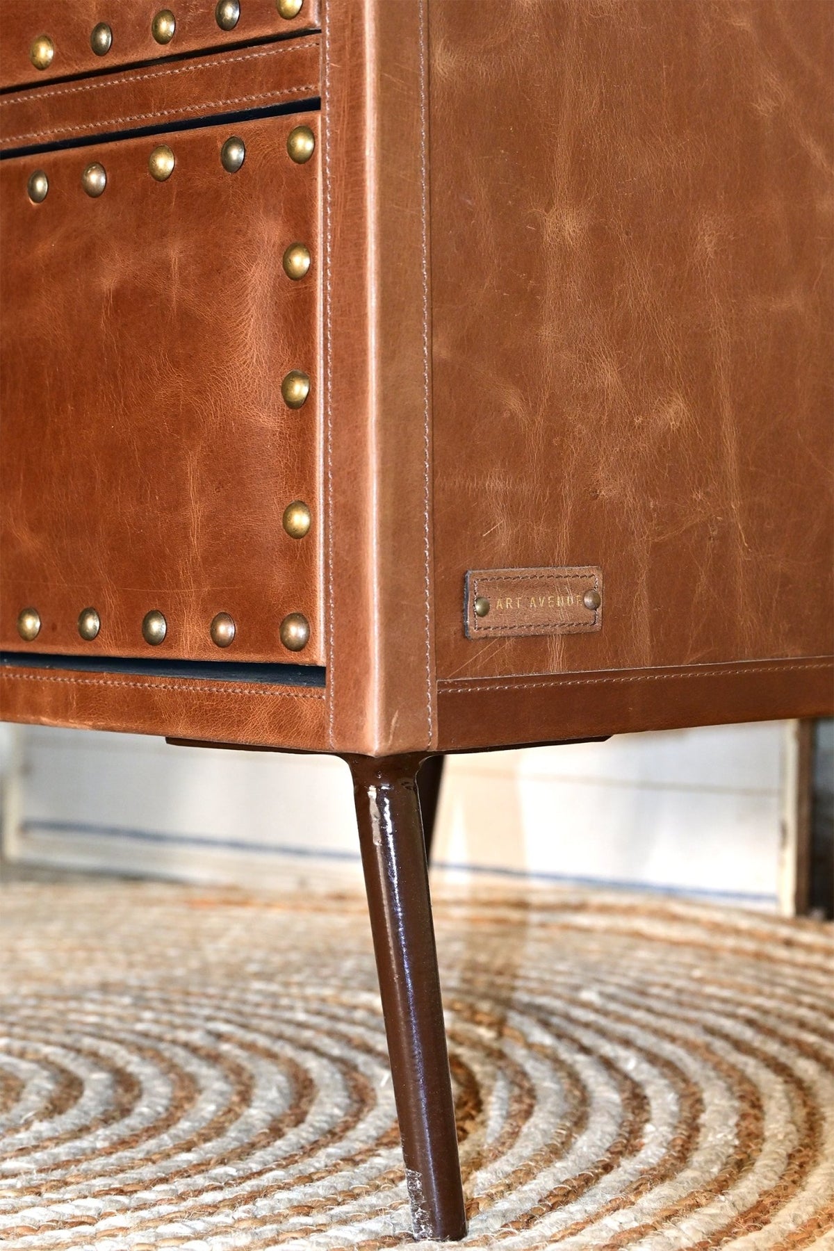Birmingham two-drawer leather side table — room setting, Art Avenue