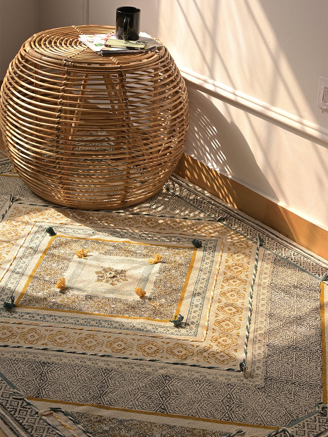 Block-printed dhurrie rug styled in living room — Art Avenue