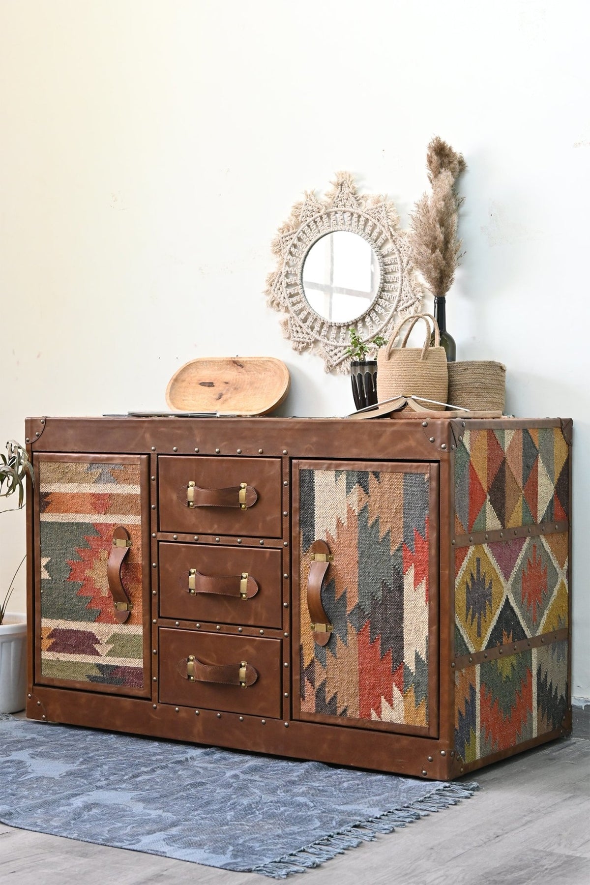 Side view of kilim and leather chest of drawers — Art Avenue