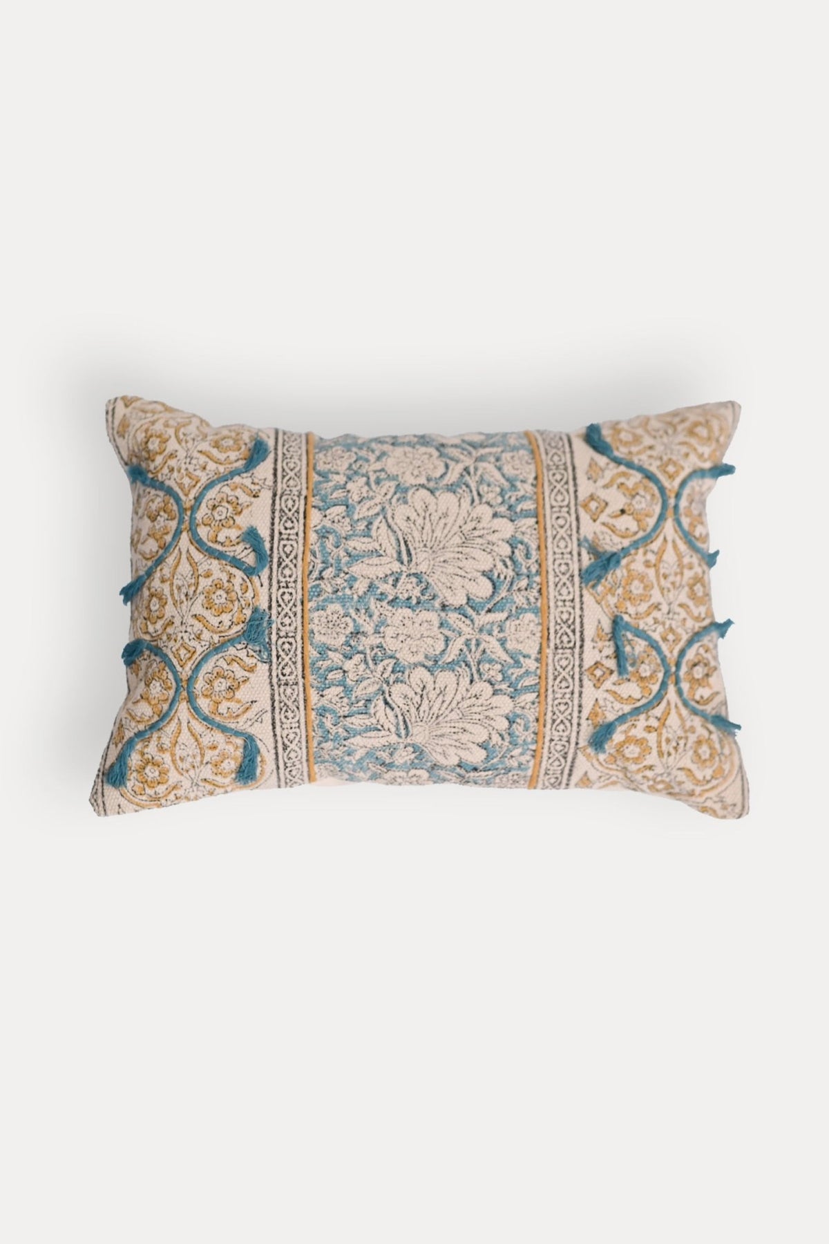 Block-printed embroidered lumbar cushion on sofa — Art Avenue