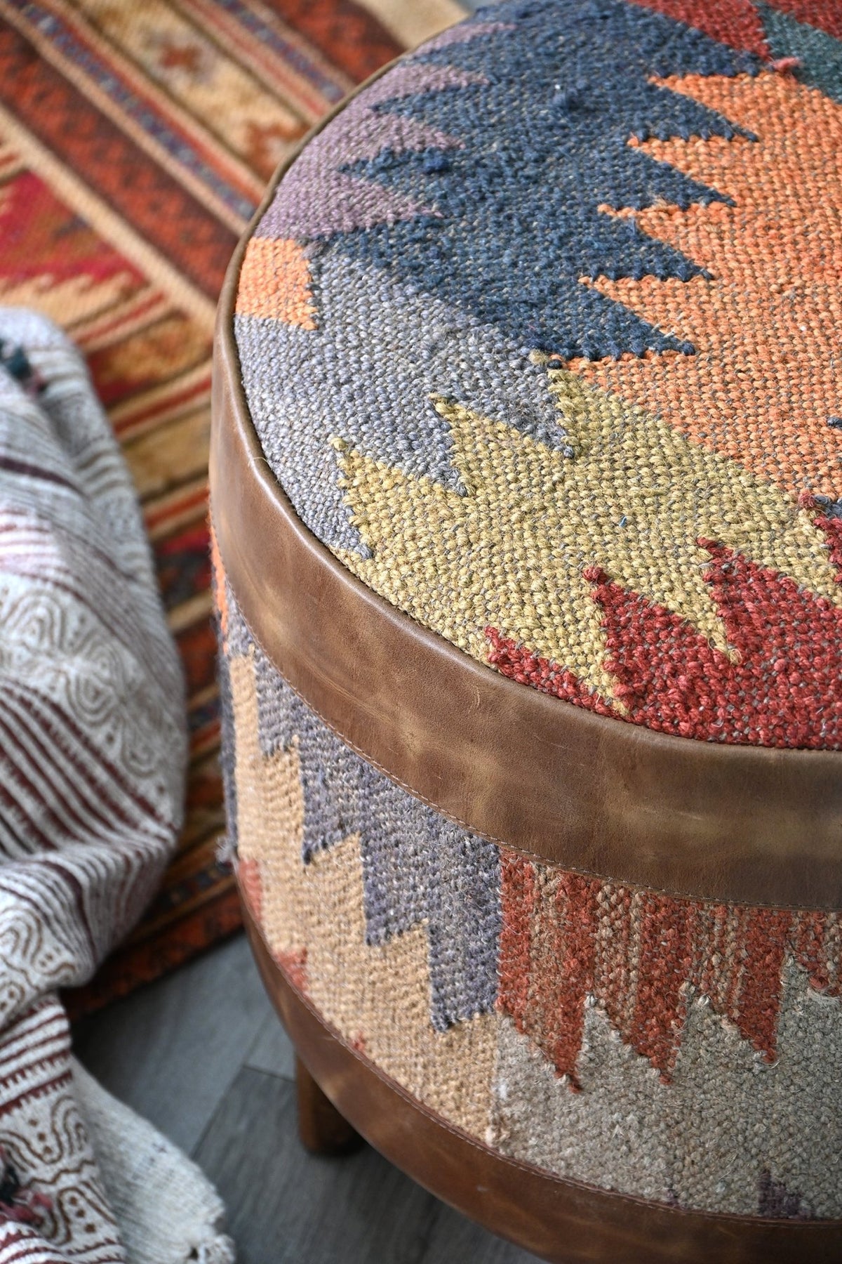 Puerto kilim leather ottoman side view — Art Avenue Jaipur