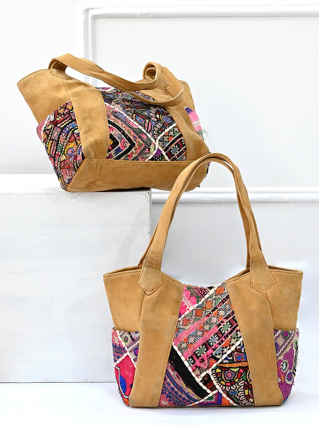 Khamsin patchwork handbag on model — Art Avenue