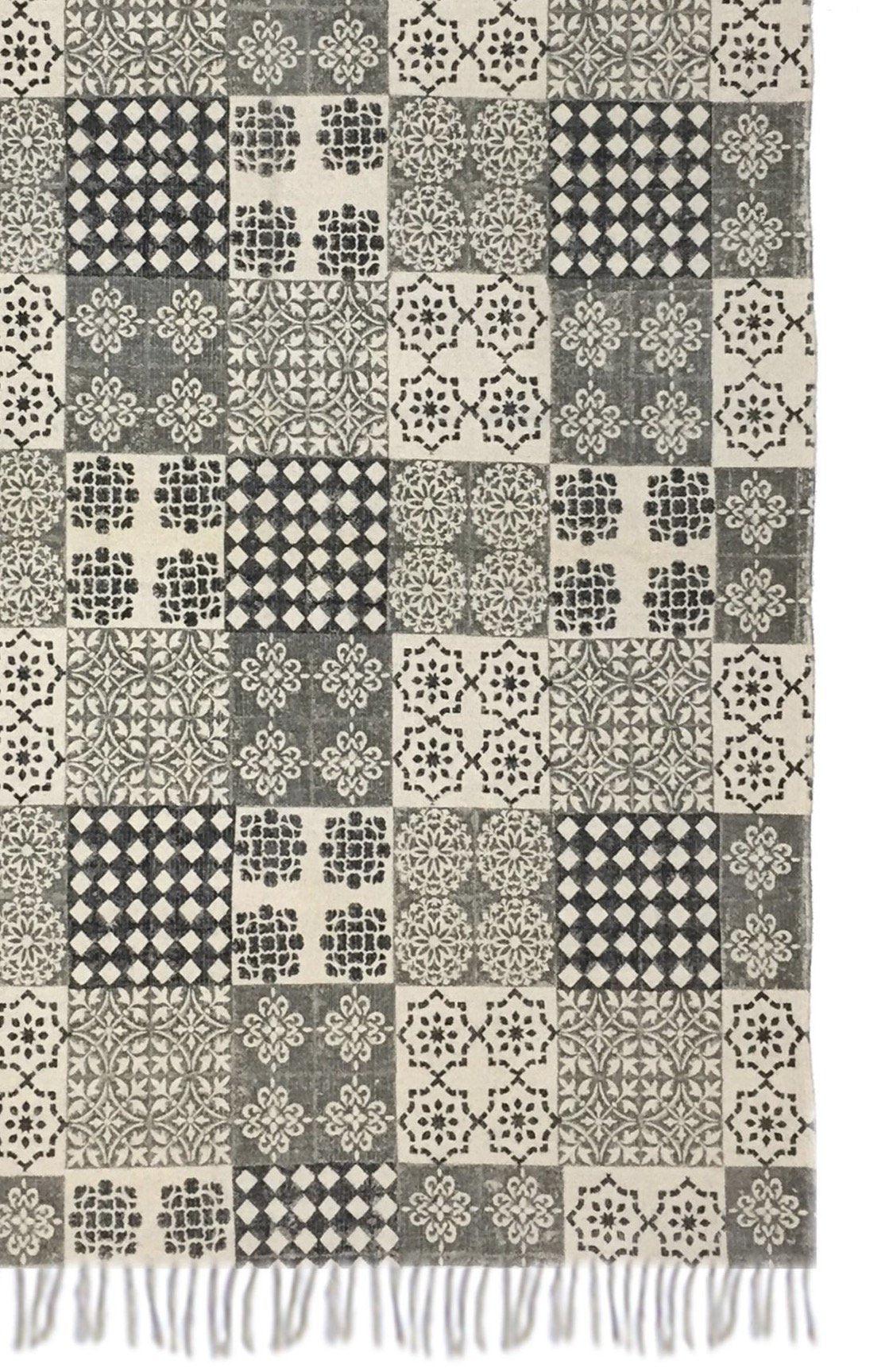 Block-printed cotton dhurrie rug in room setting — Art Avenue
