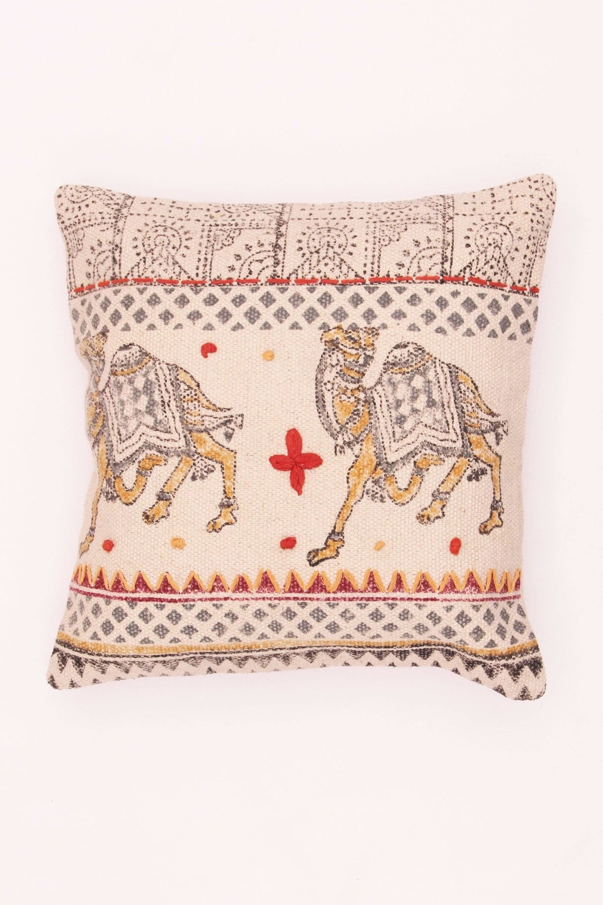 Block-printed square cushion on sofa — Art Avenue