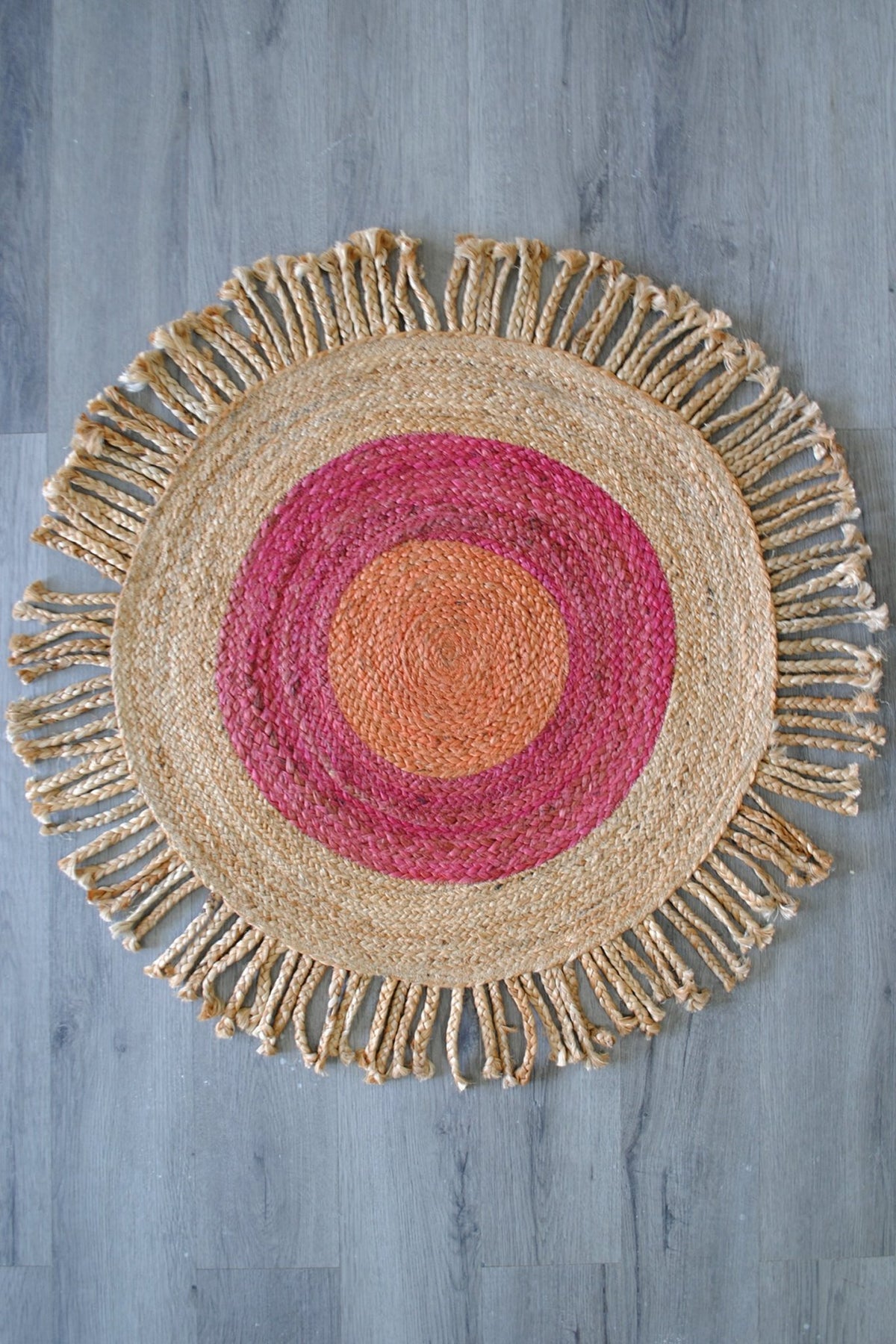 Carmine round jute rug room setting — Art Avenue India