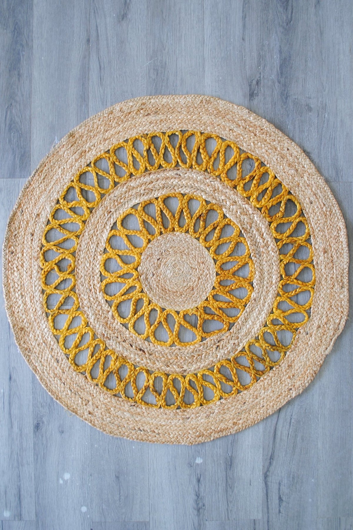 Benzal round jute rug room setting — Art Avenue India
