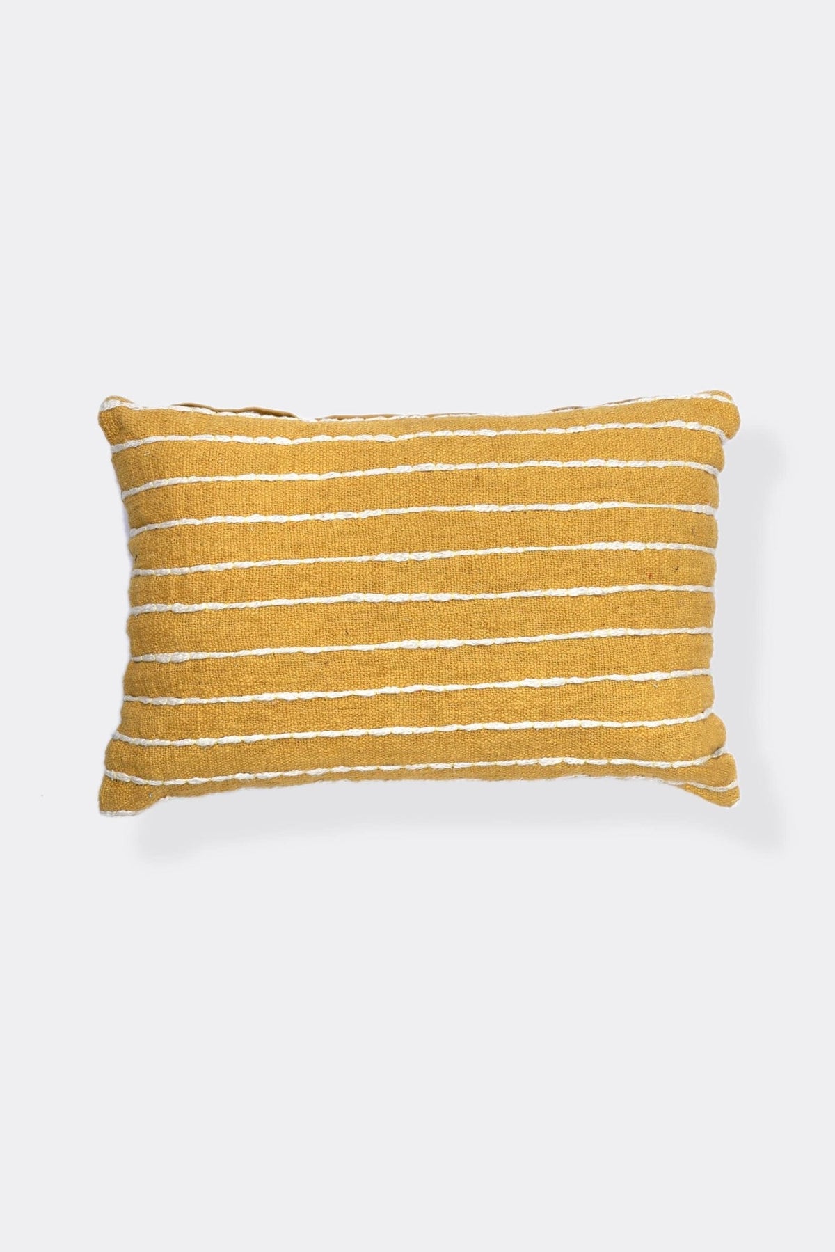 Dyed and embroidered lumbar cushion on sofa — Art Avenue