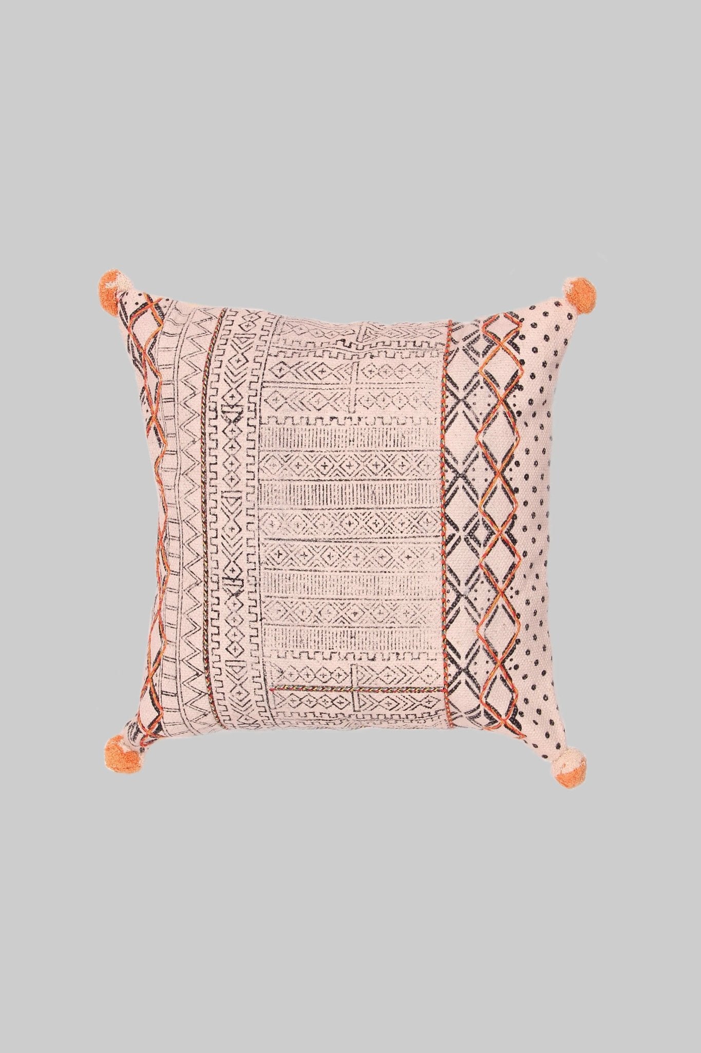 Block-printed square cushion on sofa — Art Avenue