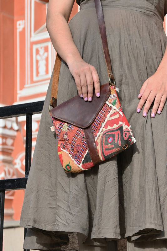 Flow patchwork leather sling bag — Art Avenue