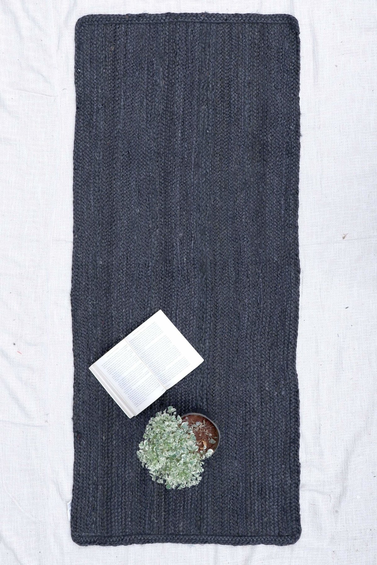 HAZE- BRAIDED FLOOR RUNNER - BLACK - ART AVENUE