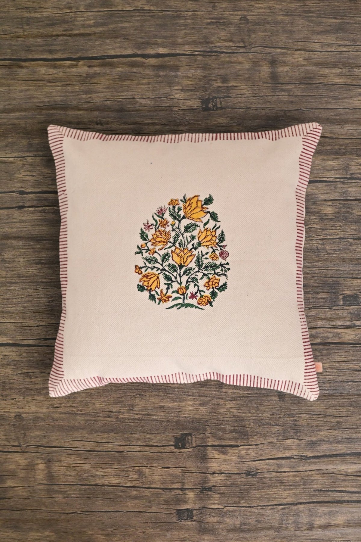 Block-printed square cushion on sofa — Art Avenue