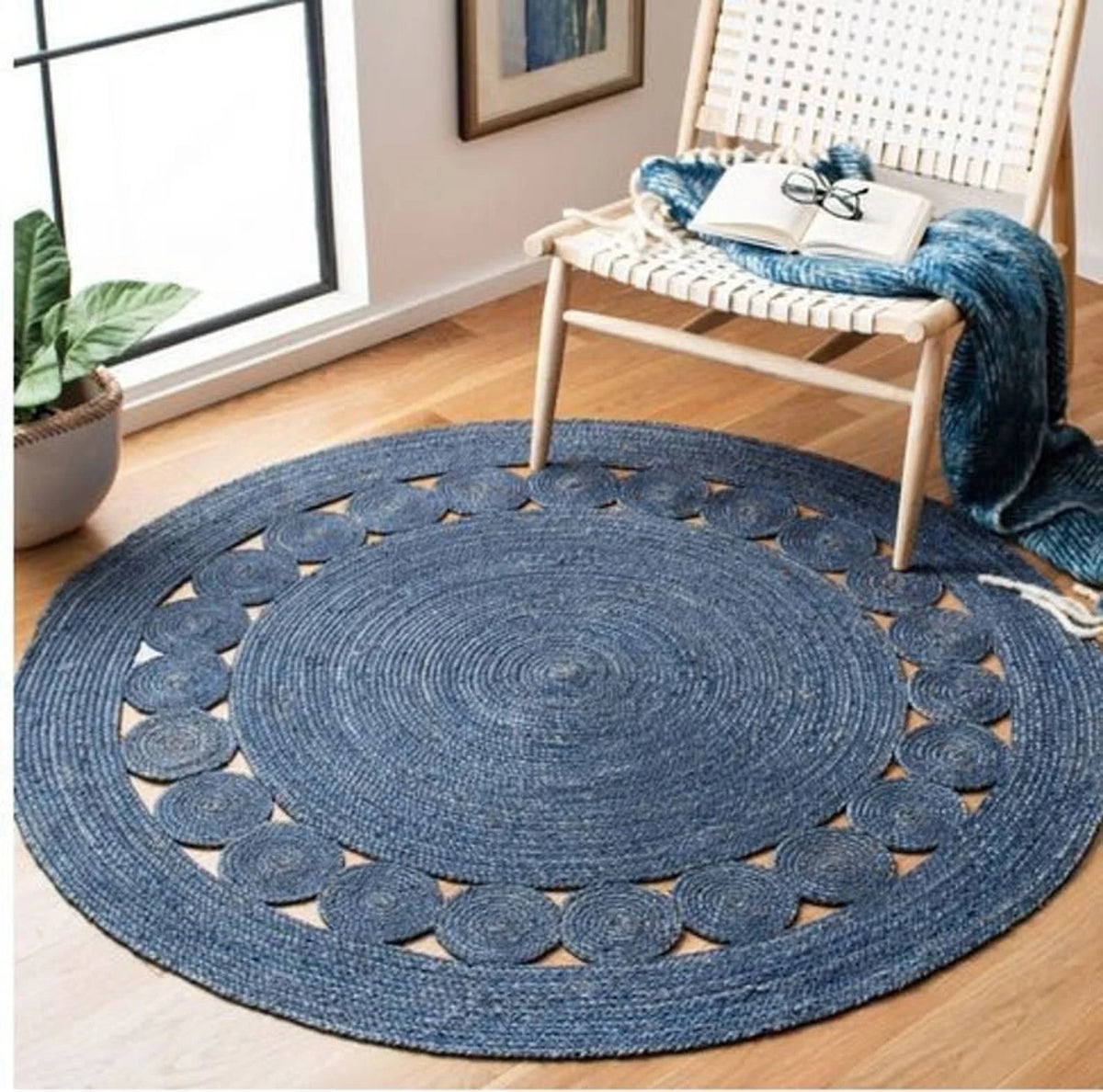 Mimosa round braided jute rug — handmade in Jaipur