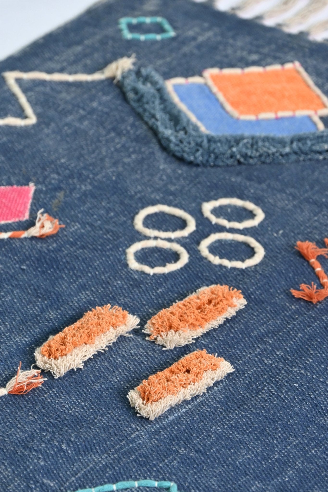 Nicobar hand-embroidered rug close-up — wool and cotton, Art Avenue