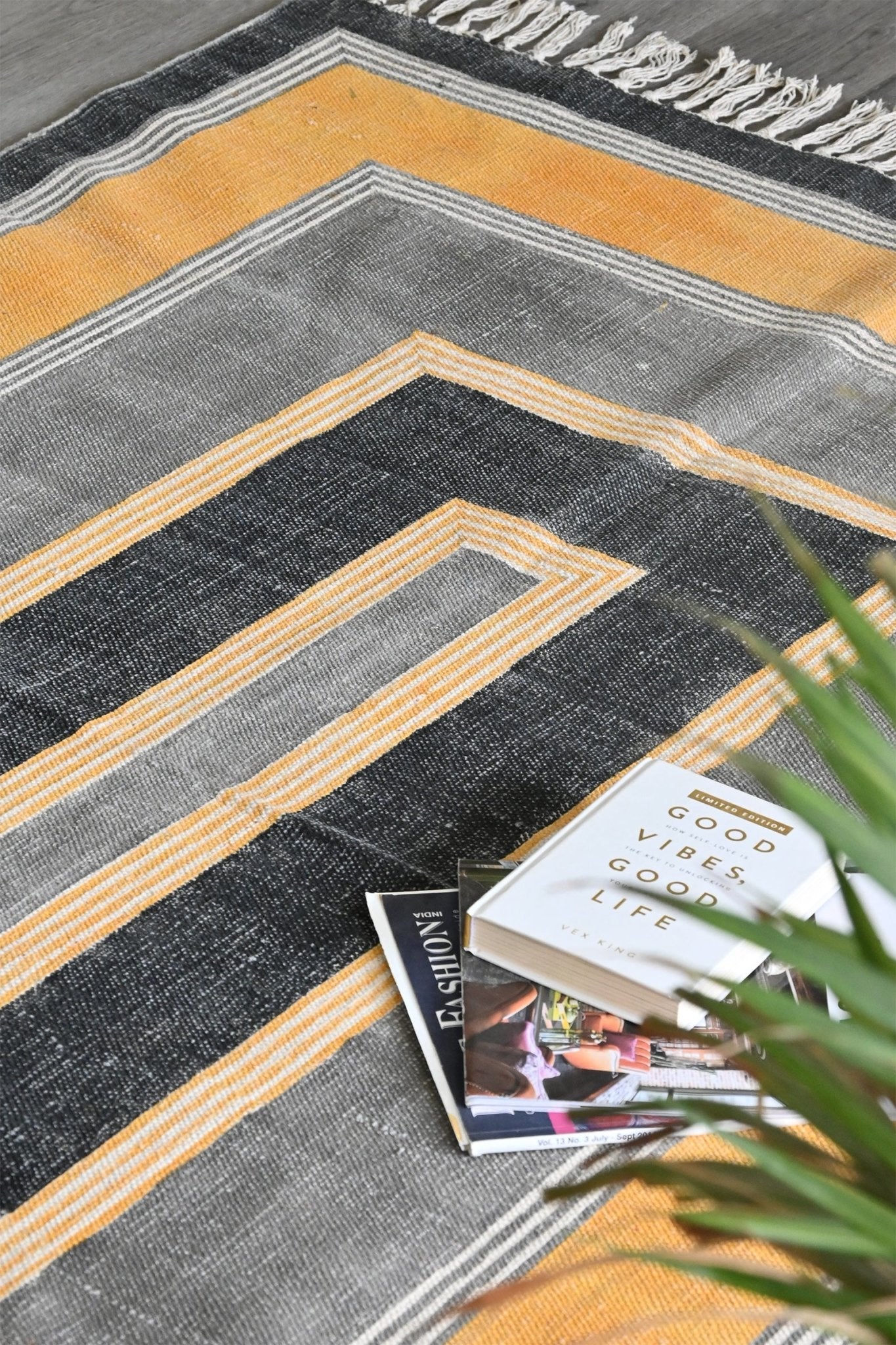 Block-printed cotton dhurrie rug in room setting — Art Avenue