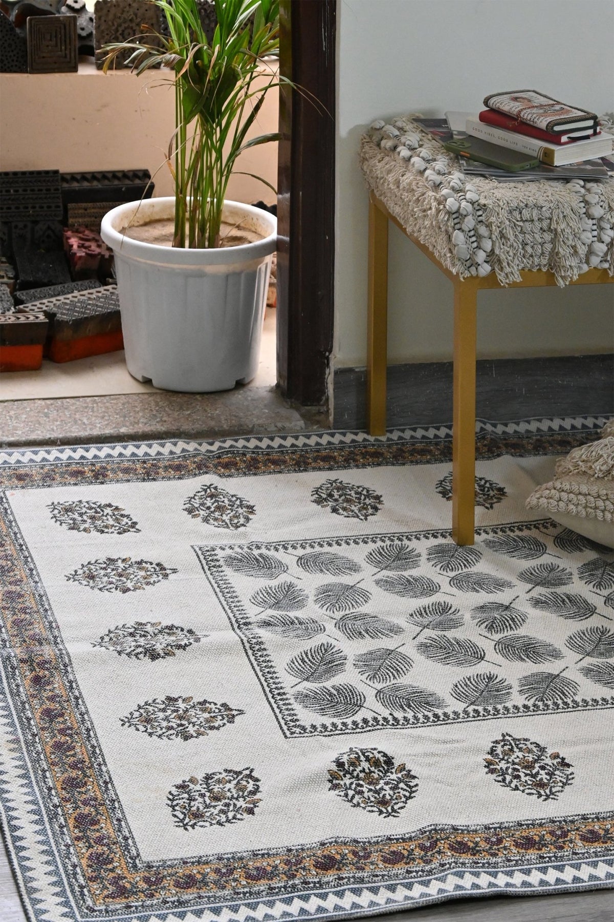 Detail of block-print on green dhurrie rug — Art Avenue