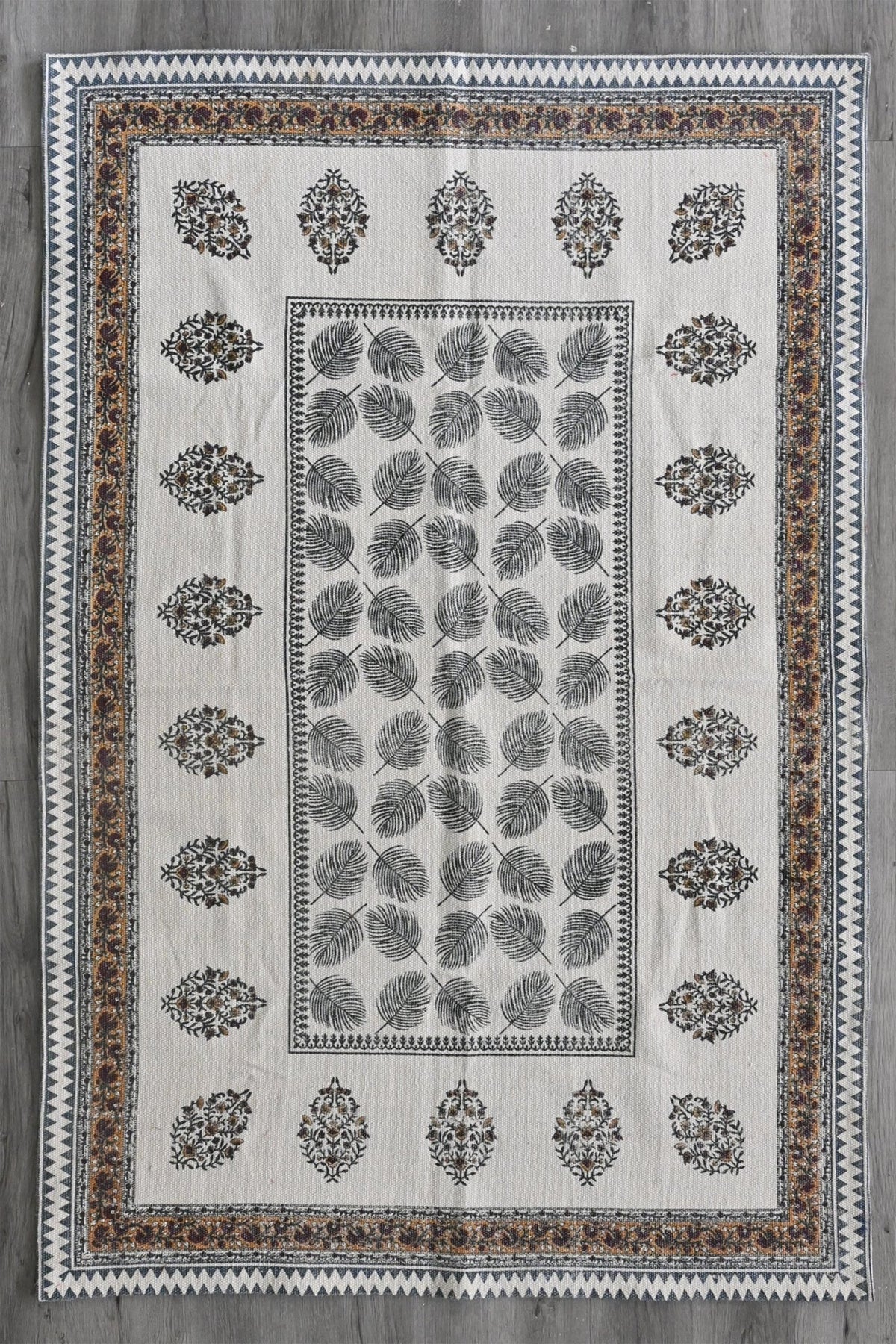 Block-printed cotton dhurrie rug in room setting — Art Avenue