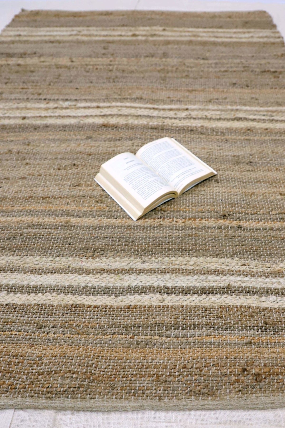 Robust handwoven rug room setting — Art Avenue
