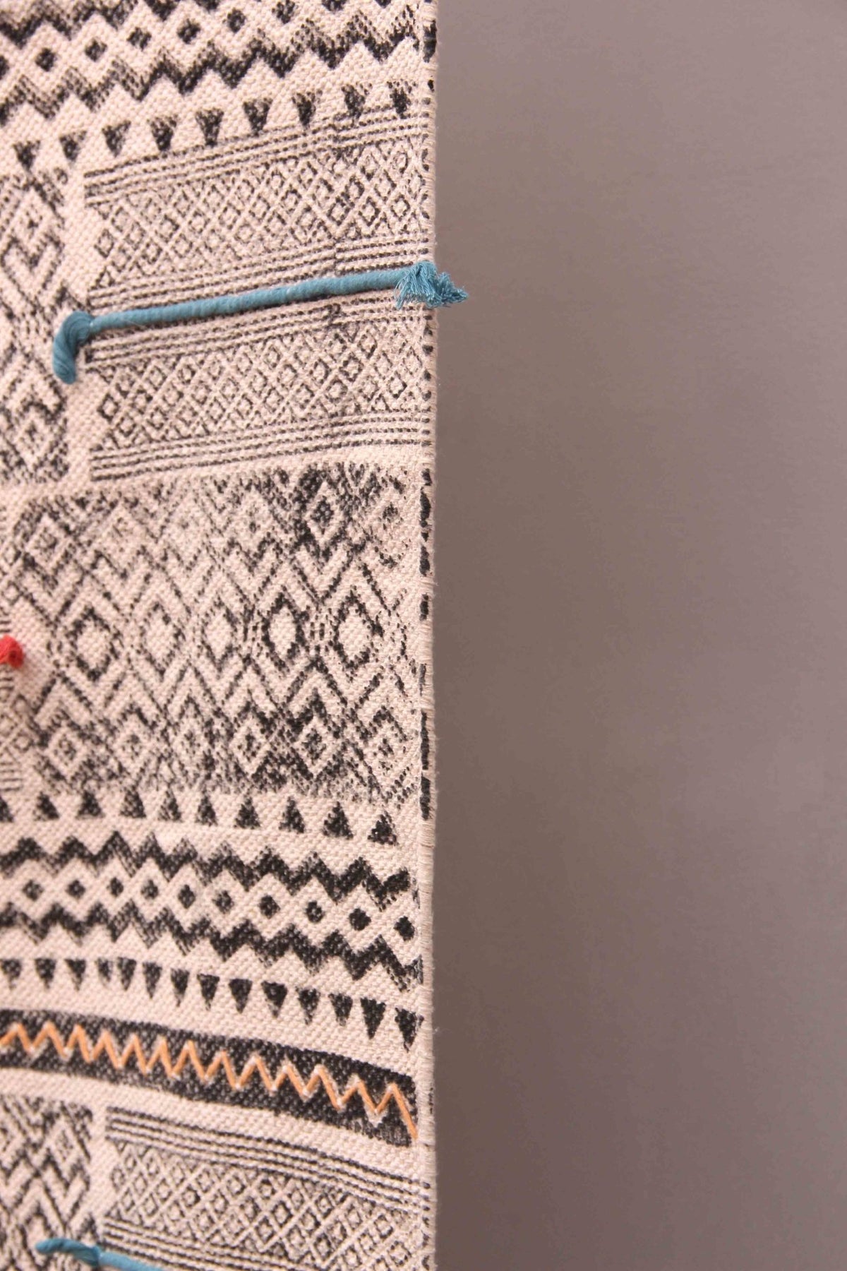 Detail of block-print on black dhurrie rug — Art Avenue