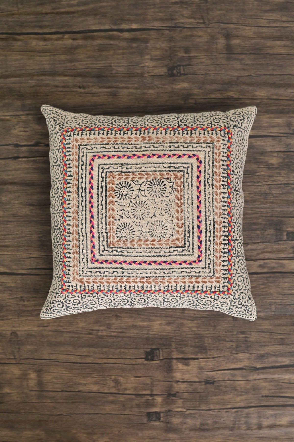 Block-printed square cushion on sofa — Art Avenue