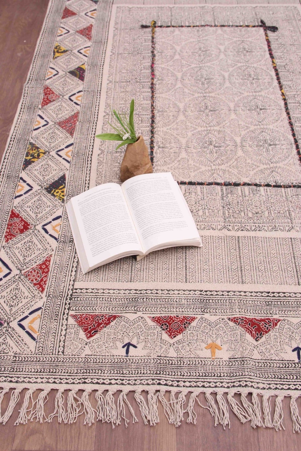 Detail of block-print on black dhurrie rug — Art Avenue