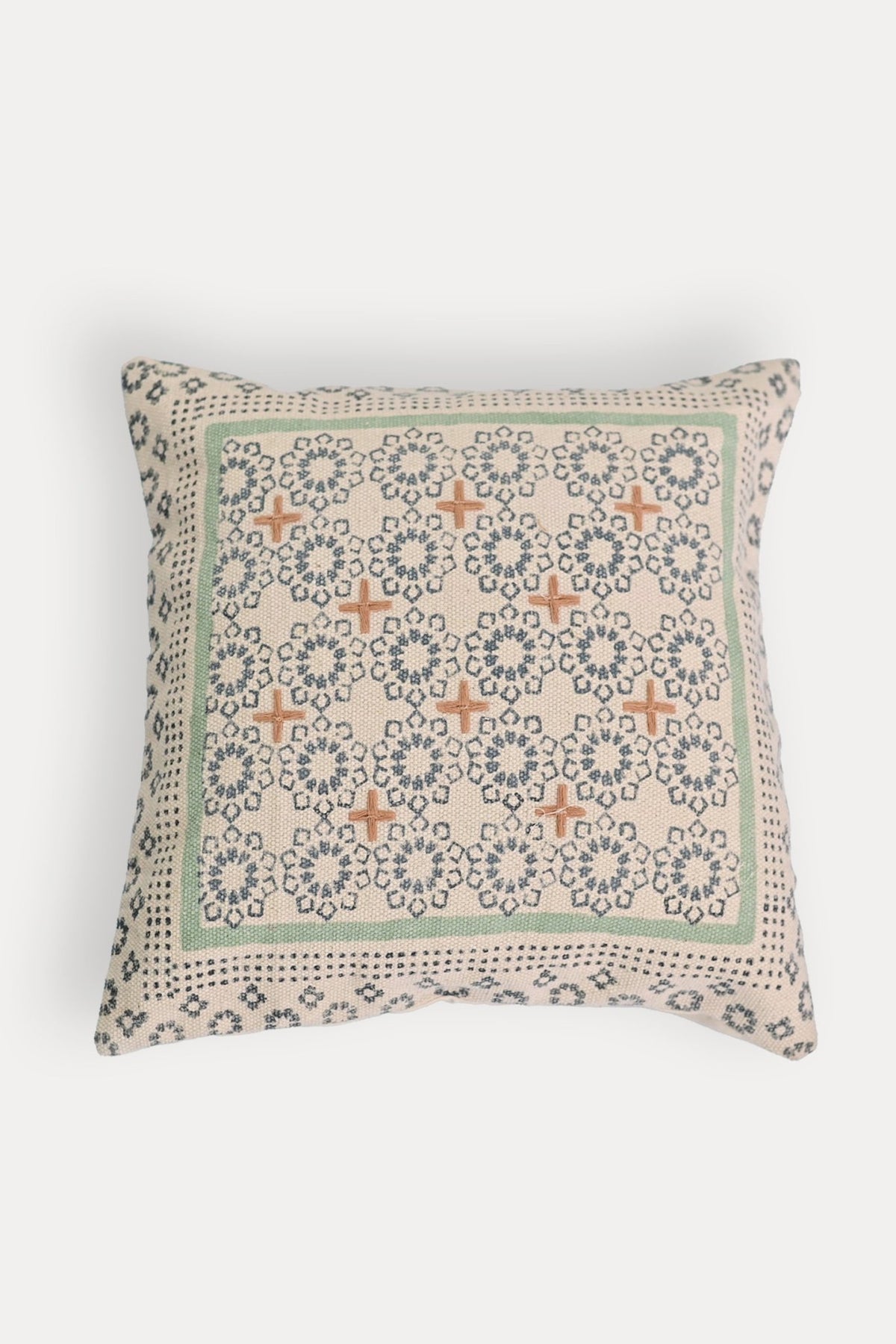 Block-printed square cushion on sofa — Art Avenue