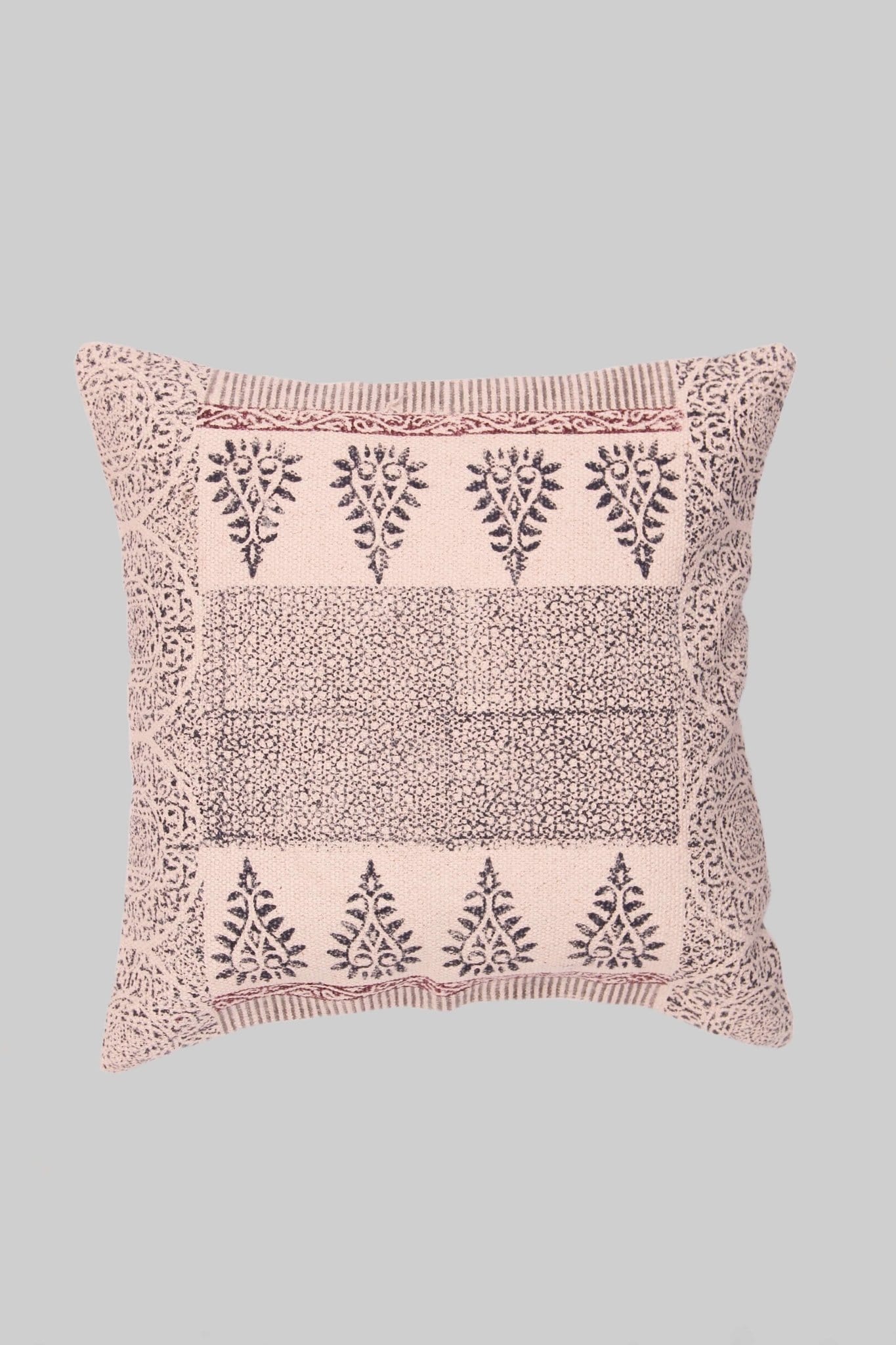 Block-printed square cushion on sofa — Art Avenue