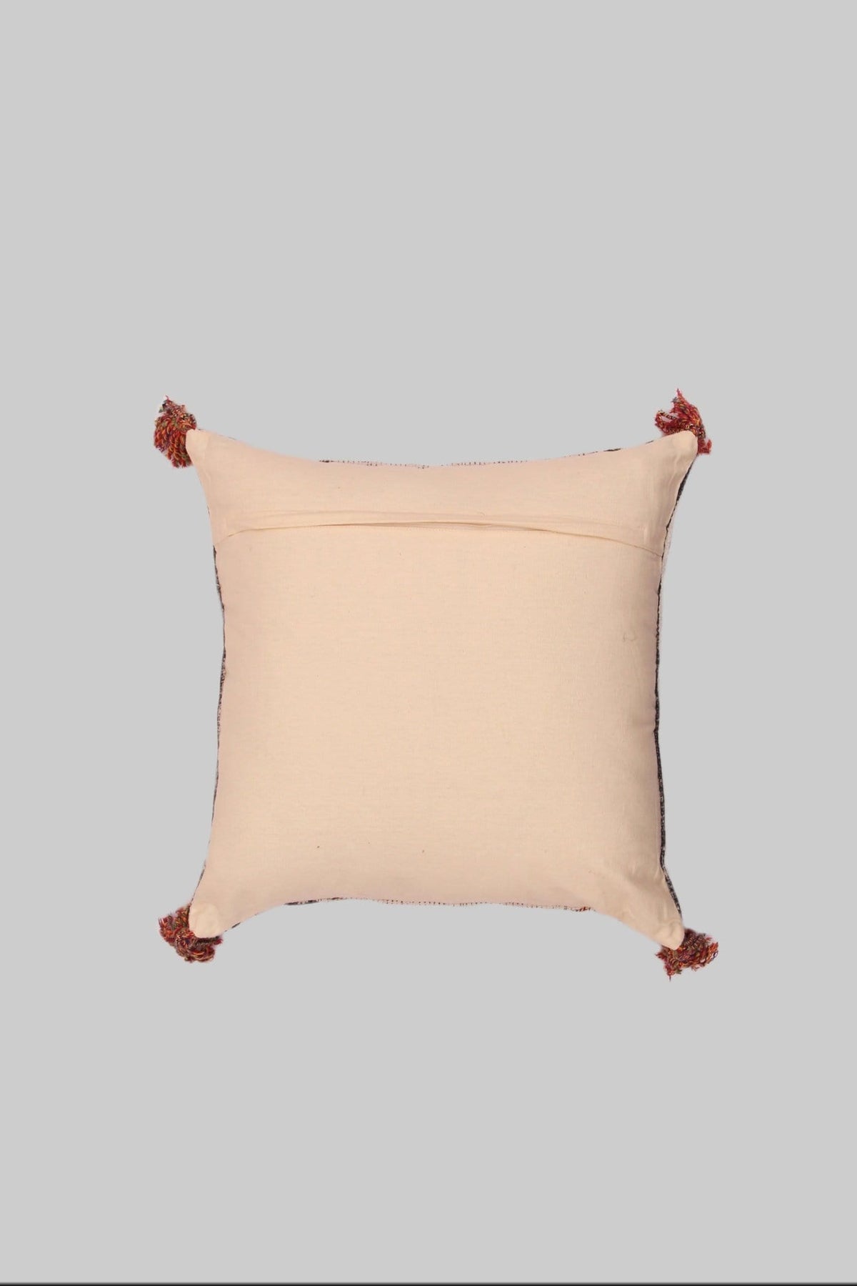 Block-printed square cushion on sofa — Art Avenue
