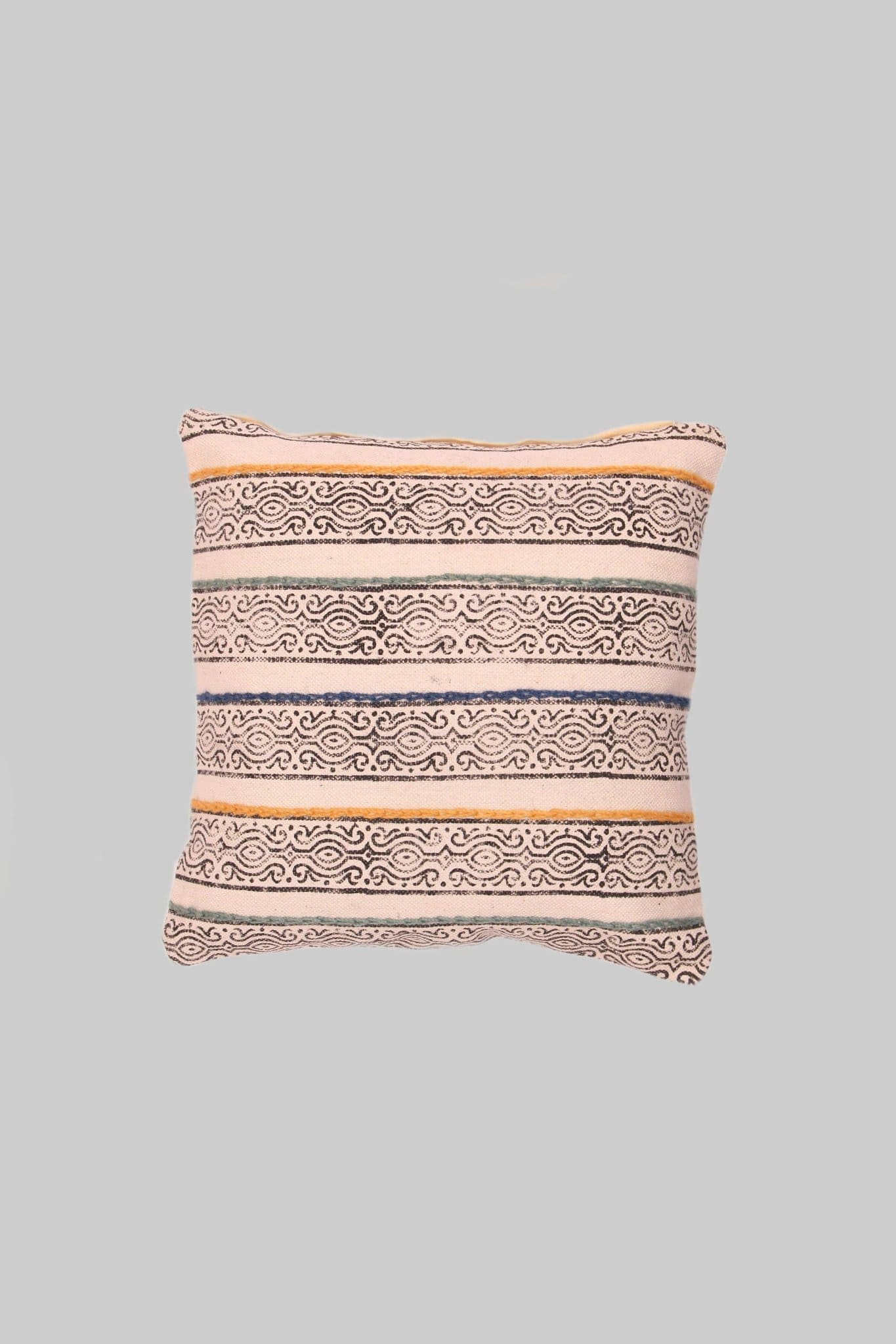 Block-printed square cushion on sofa — Art Avenue
